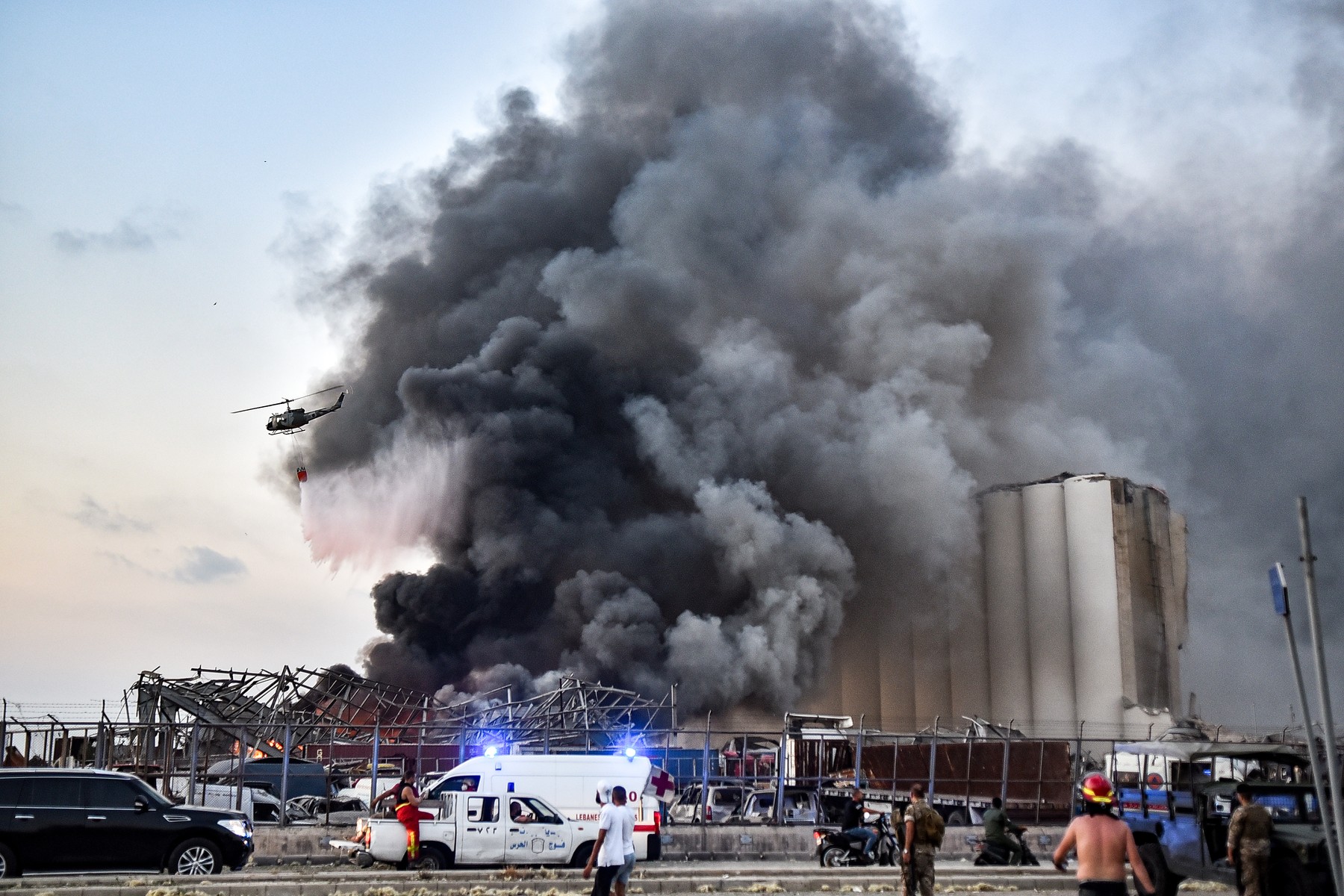 A helicopter puts out a fire at the scene of an explosion at the port of Lebanon's capital Beirut on August 4, 2020.,Image: 549848780, License: Rights-managed, Restrictions: Graphic Content, Model Release: no, Credit line: STR / AFP / Profimedia