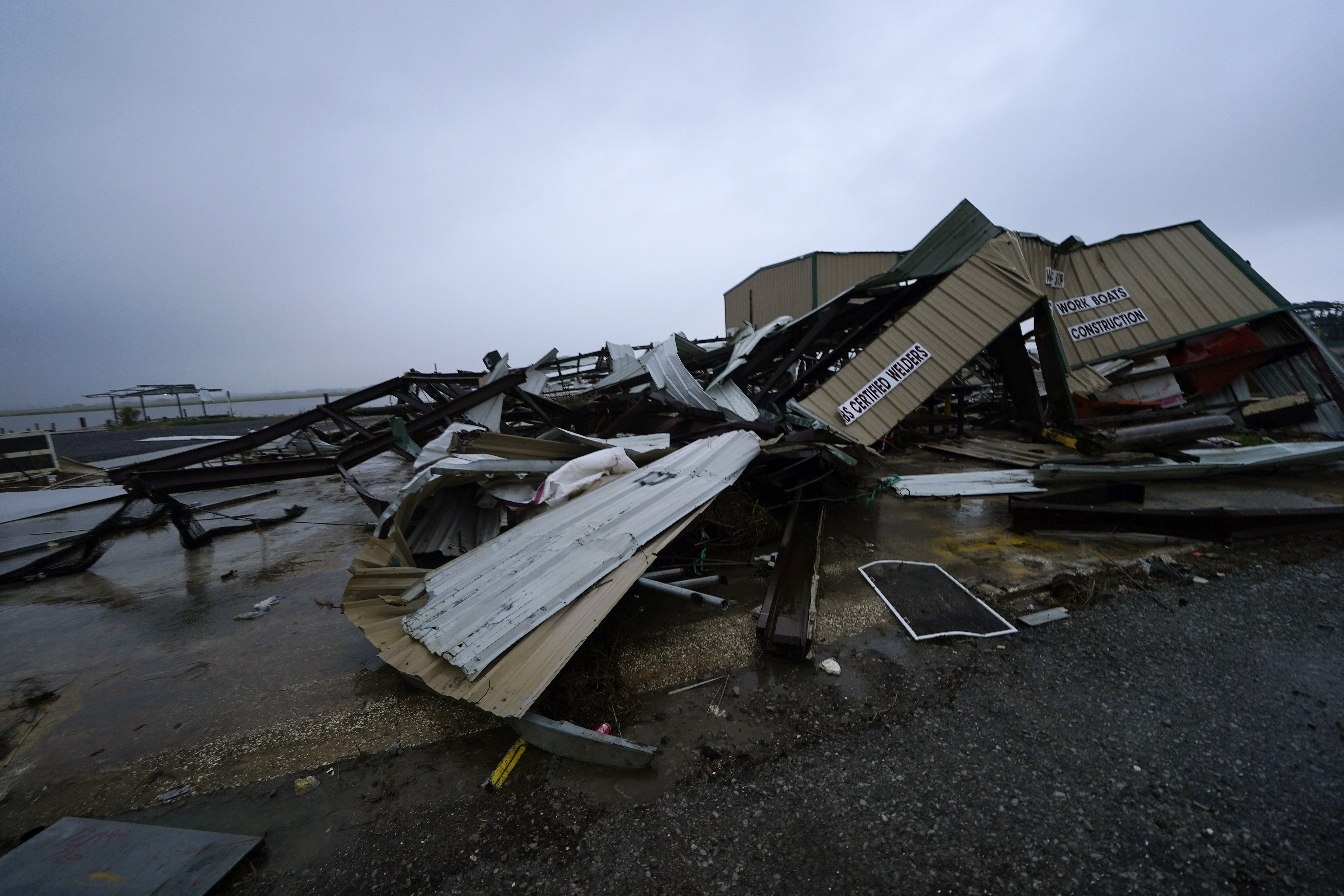 A business destroyed from Hurricane Laura lies in pieces, Thursday, Oct. 8, 2020, in Cameron, La., in advance of Hurricane Delta, which is expected to make landfall Friday. (AP Photo/Gerald Herbert)