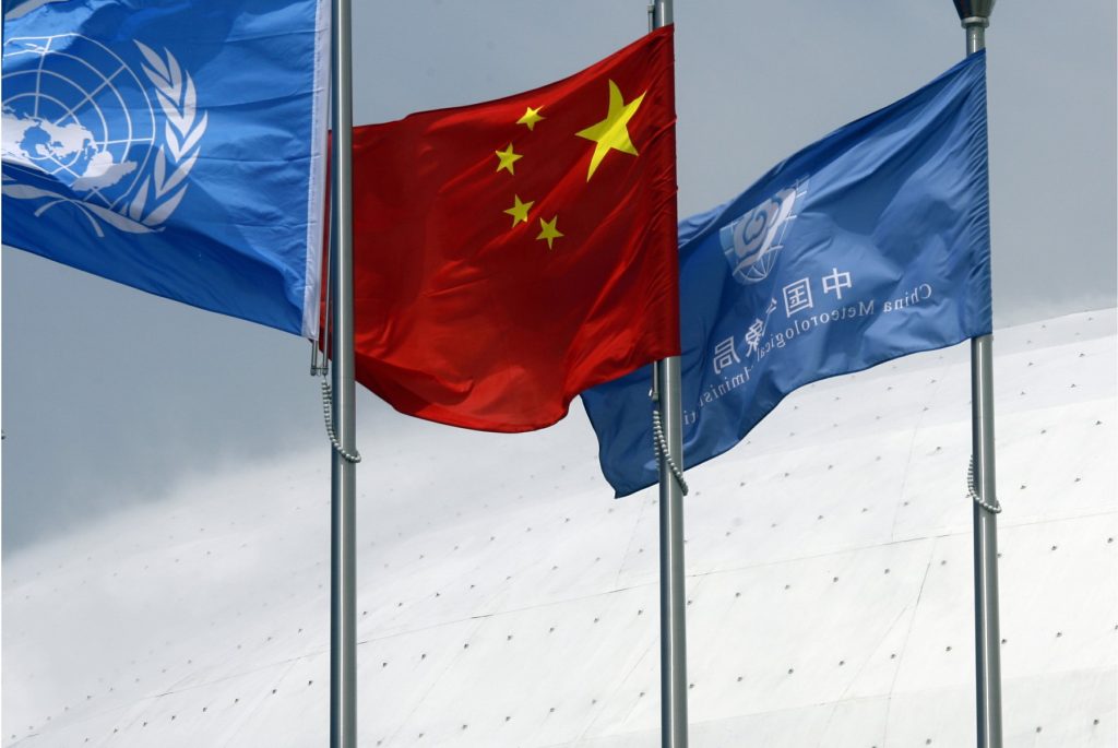China's national flag waves along side with the United Nations (UN) flag at the Shanghai World Expo on May 4, 2010. (EPN Photo/Rachel Li),Image: 63892994, License: Rights-managed, Restrictions: , Model Release: no, Credit line: EyePress / AFP / Profimedia
