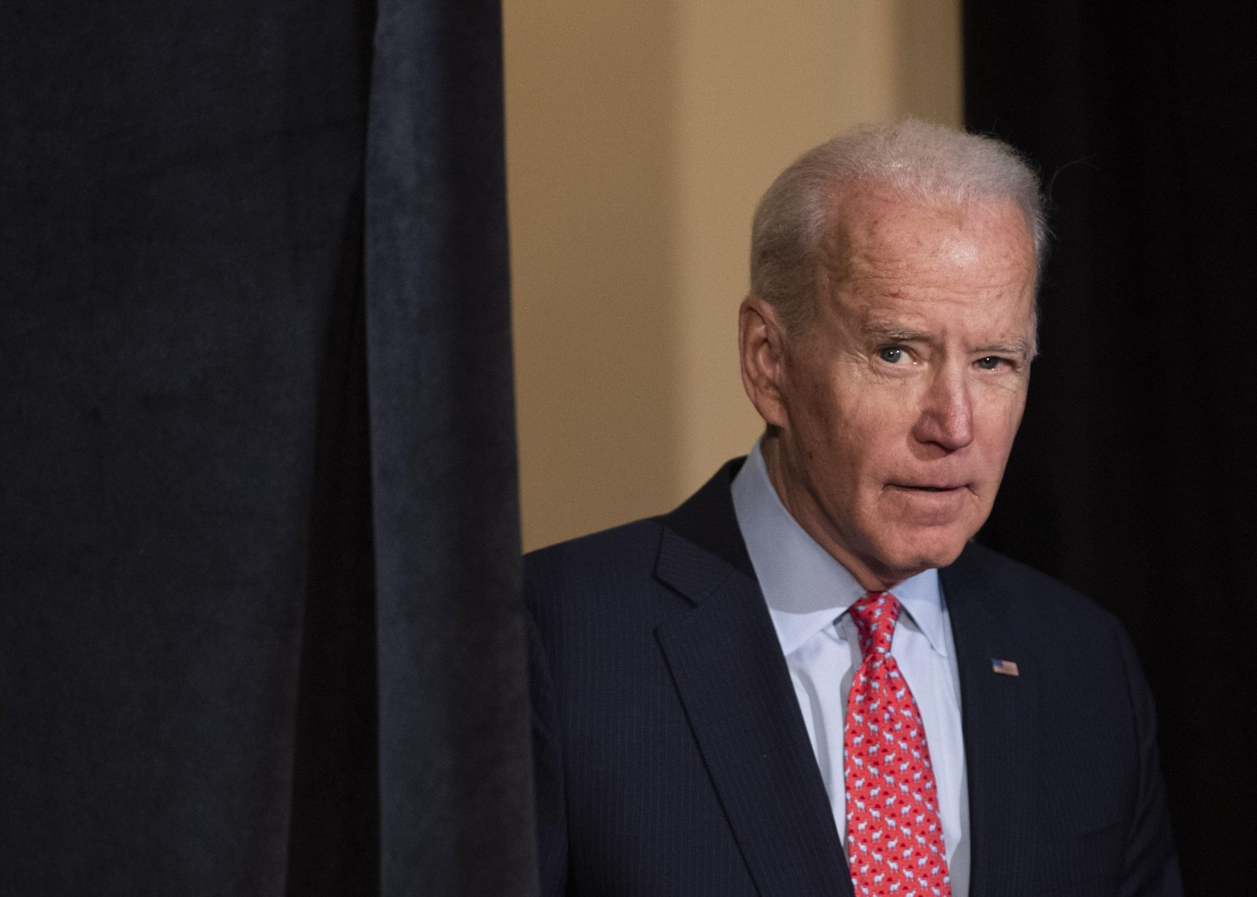 Wilmington, United States. 12th Mar, 2020. Democratic presidential candidate former Vice President Joe Biden waits to the podium to deliver remakes on the Coronavirus (COVID-19) in Wilmington, Delaware on Thursday, March 12, 2020. Photo by Kevin Dietsch/U