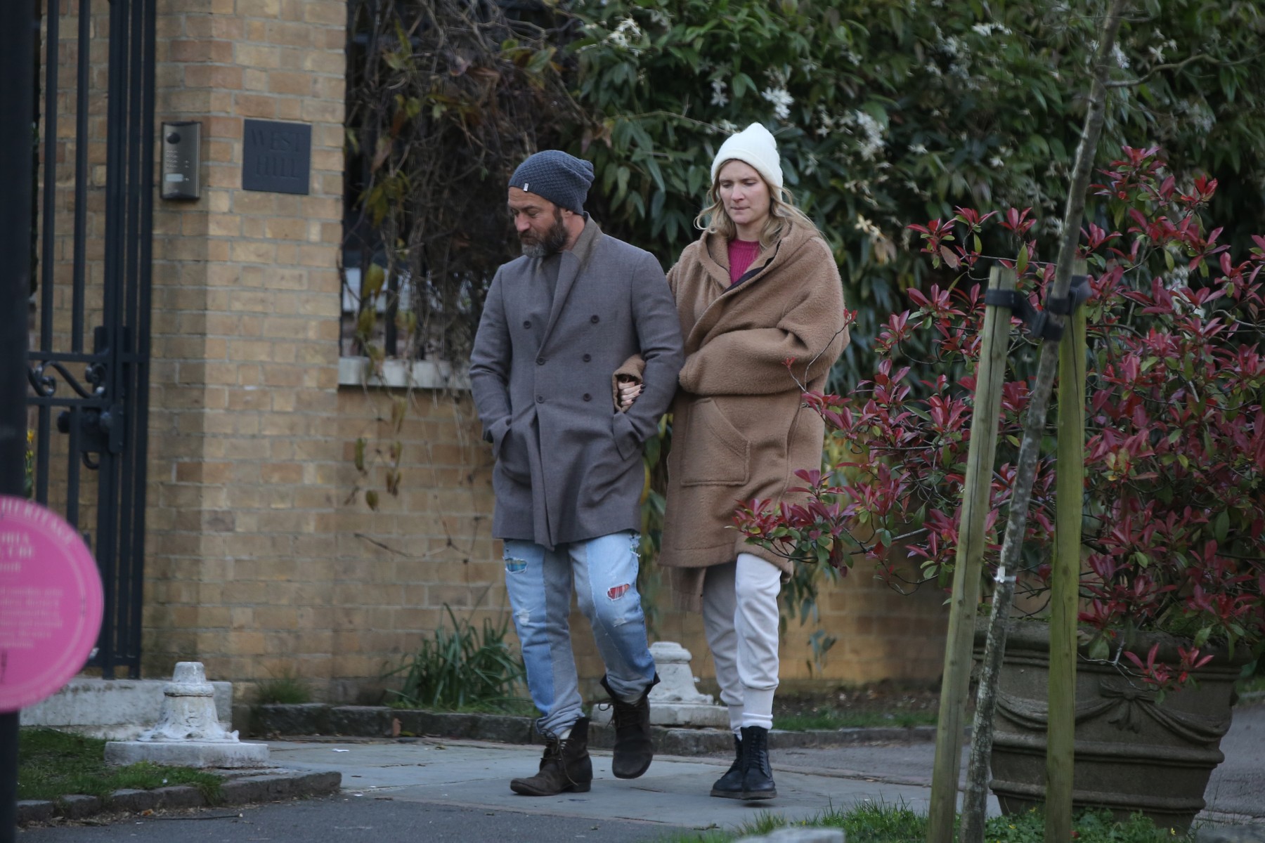 EXCLUSIVE: Bearded Jude Law, and wife Phillipa Coan emerge from home quarantine