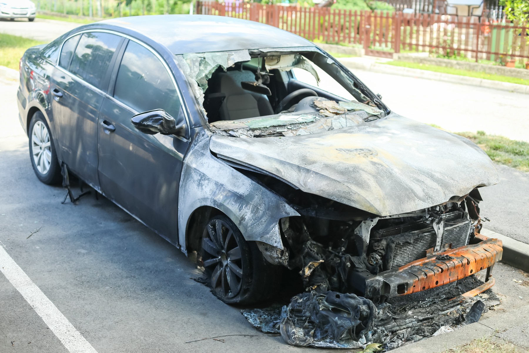 The exterior of a burned out car at a parking lot., Image: 340974411, License: Royalty-free, Restrictions: , Model Release: no, Credit line: Goran Jakuš / Panthermedia / Profimedia