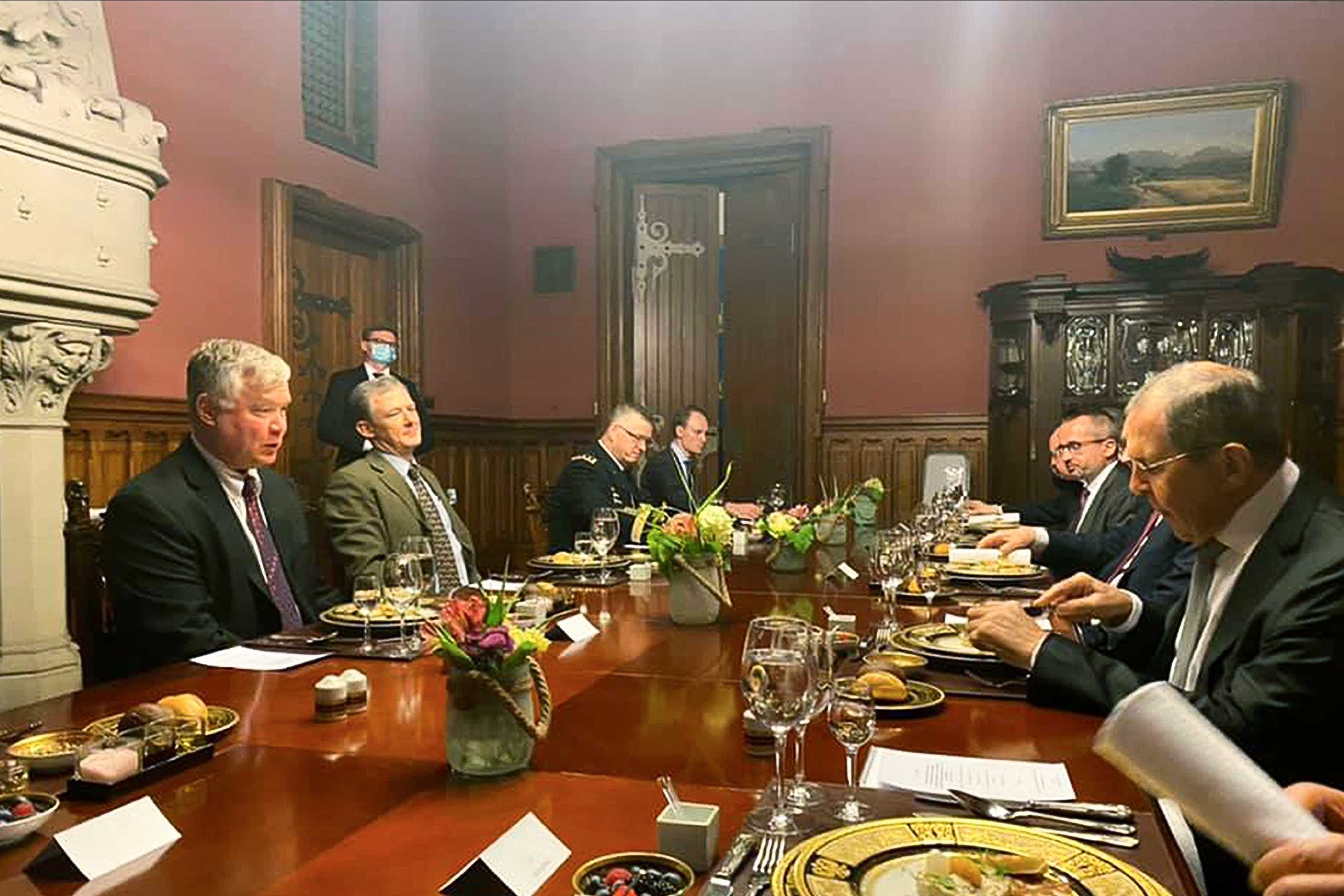 Russian Foreign Minister Sergey Lavrov, right, and U.S. Deputy Secretary of State Stephen Biegun, left, talk during their meeting in Moscow, Russia, Tuesday, Aug. 25, 2020. (Maria Zakharova via AP)