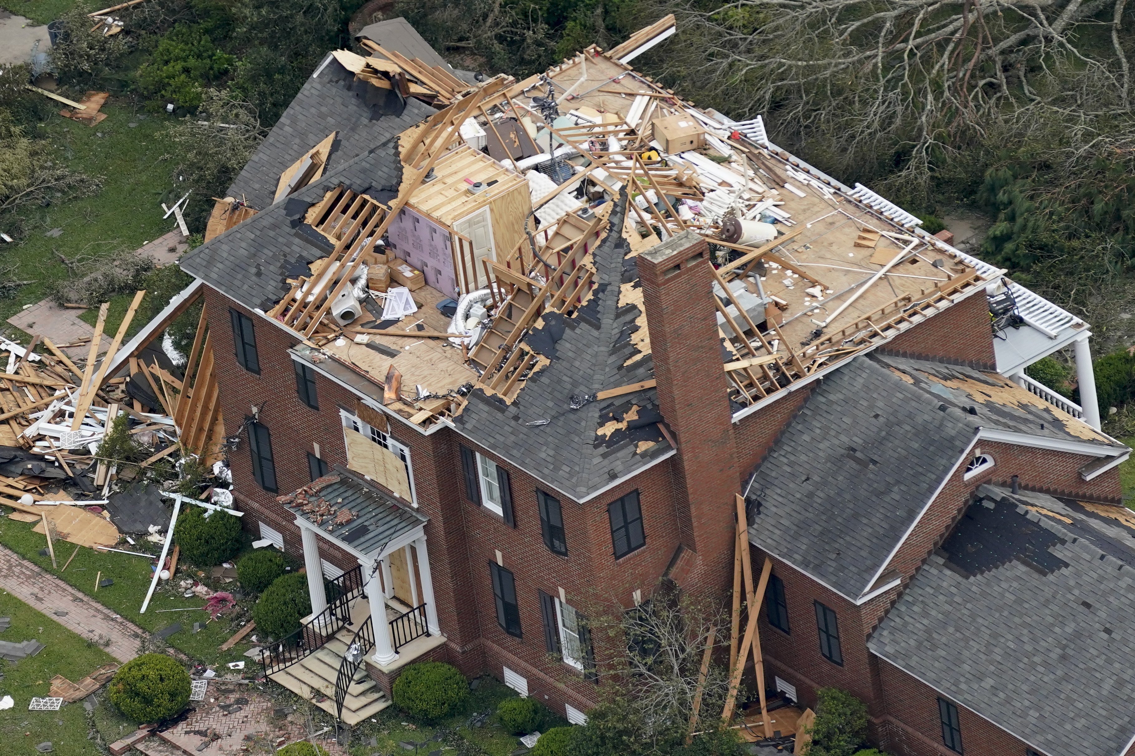 A Home is damaged Thursday, Aug. 27, 2020, after Hurricane Laura went through the area near Lake Charles, La. (AP Photo/David J. Phillip)