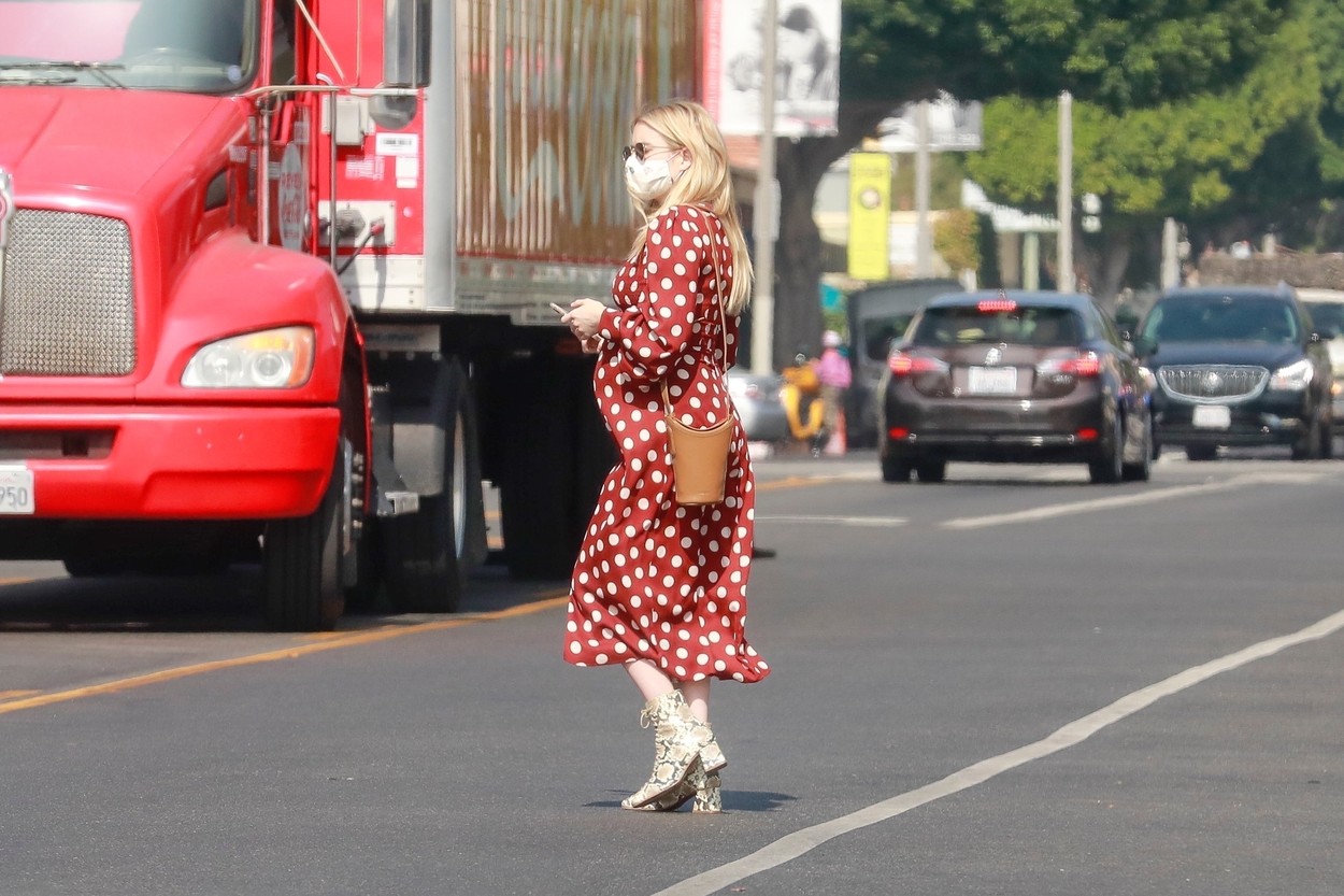 *EXCLUSIVE* Pregnant Emma Roberts wears a polka dot dress running errands in LA
