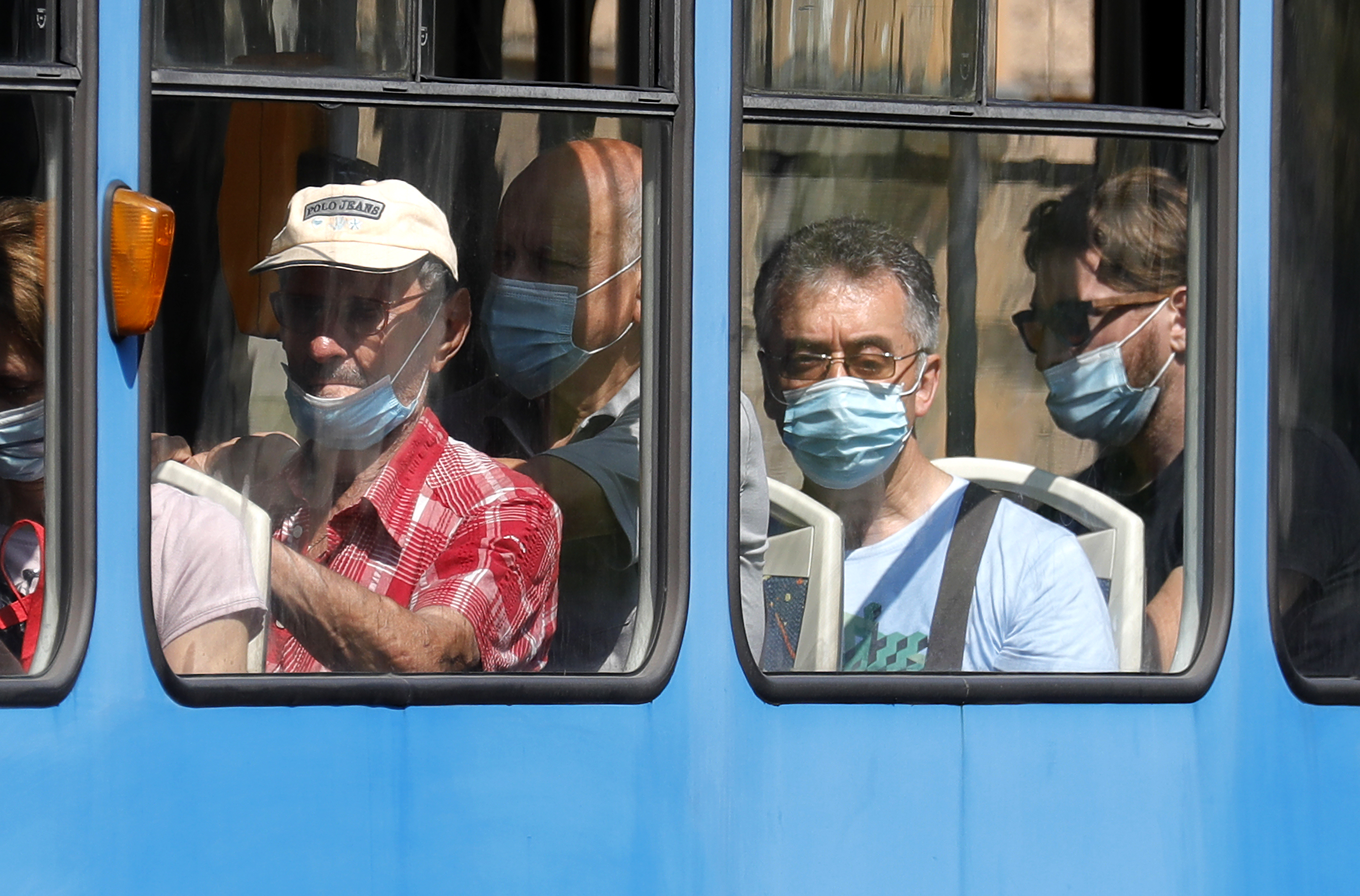 epa08608835 Citizens in a tram with face masks in Zagreb, Croatia, 17 August 2020. Croatia is currently witnessing a surge in COVID19 cases.  EPA-EFE/ANTONIO BAT