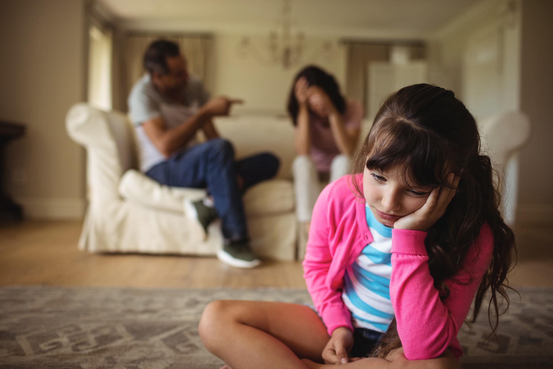 Sad girl listening to her parents arguing at home,Image: 326875167, License: Rights-managed, Restrictions: , Model Release: yes, Credit line: - / Wavebreak / Profimedia