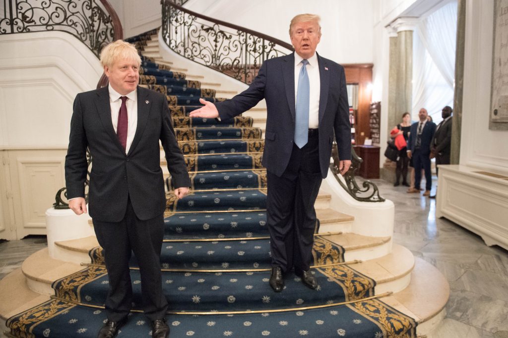 epa07791960 Britain's Prime Minister Boris Johnson (L) and US President Donald J. Trump (R) prior to their bilateral talks during the G7 summit in Biarritz, France, 25 August 2019. The G7 Summit runs from 24 to 26 August in Biarritz.