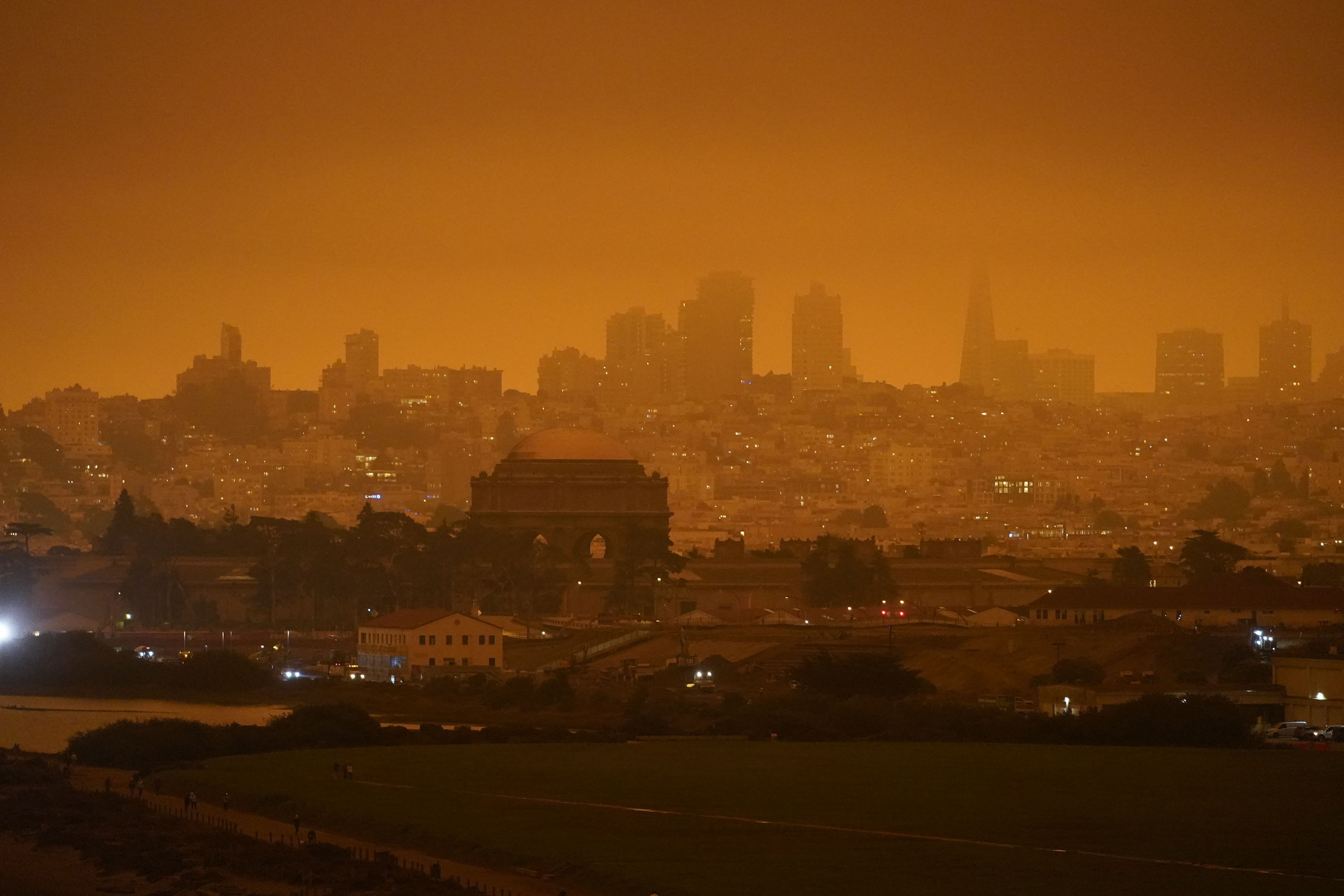 The skyline in the distance behind Crissy Field is barely visible with smoke from wildfires Wednesday, Sept. 9, 2020, in San Francisco. (AP Photo/Eric Risberg)