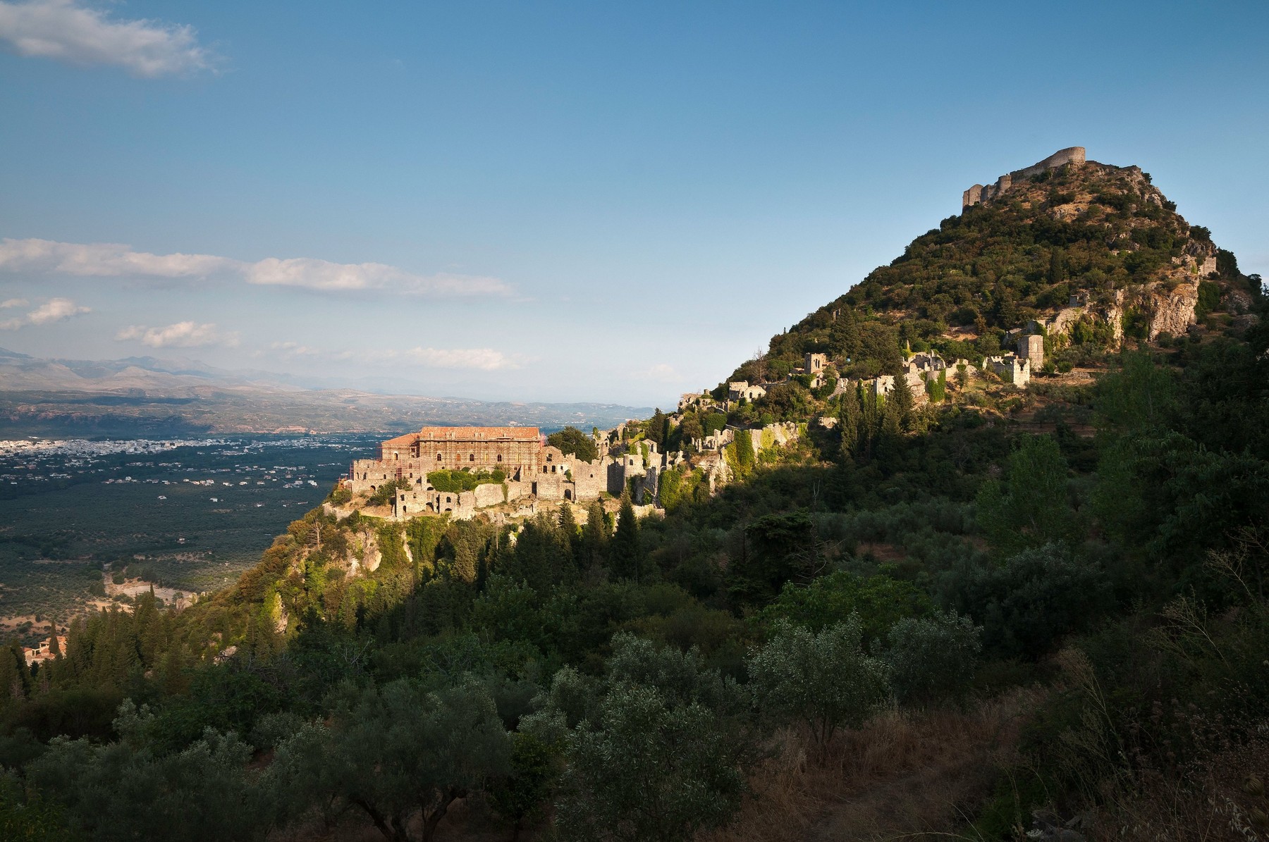 The palace and castle of Byzantine Mystras with the plains and city of Sparta in the background, Lakonia, Pelopoponnes, Greece