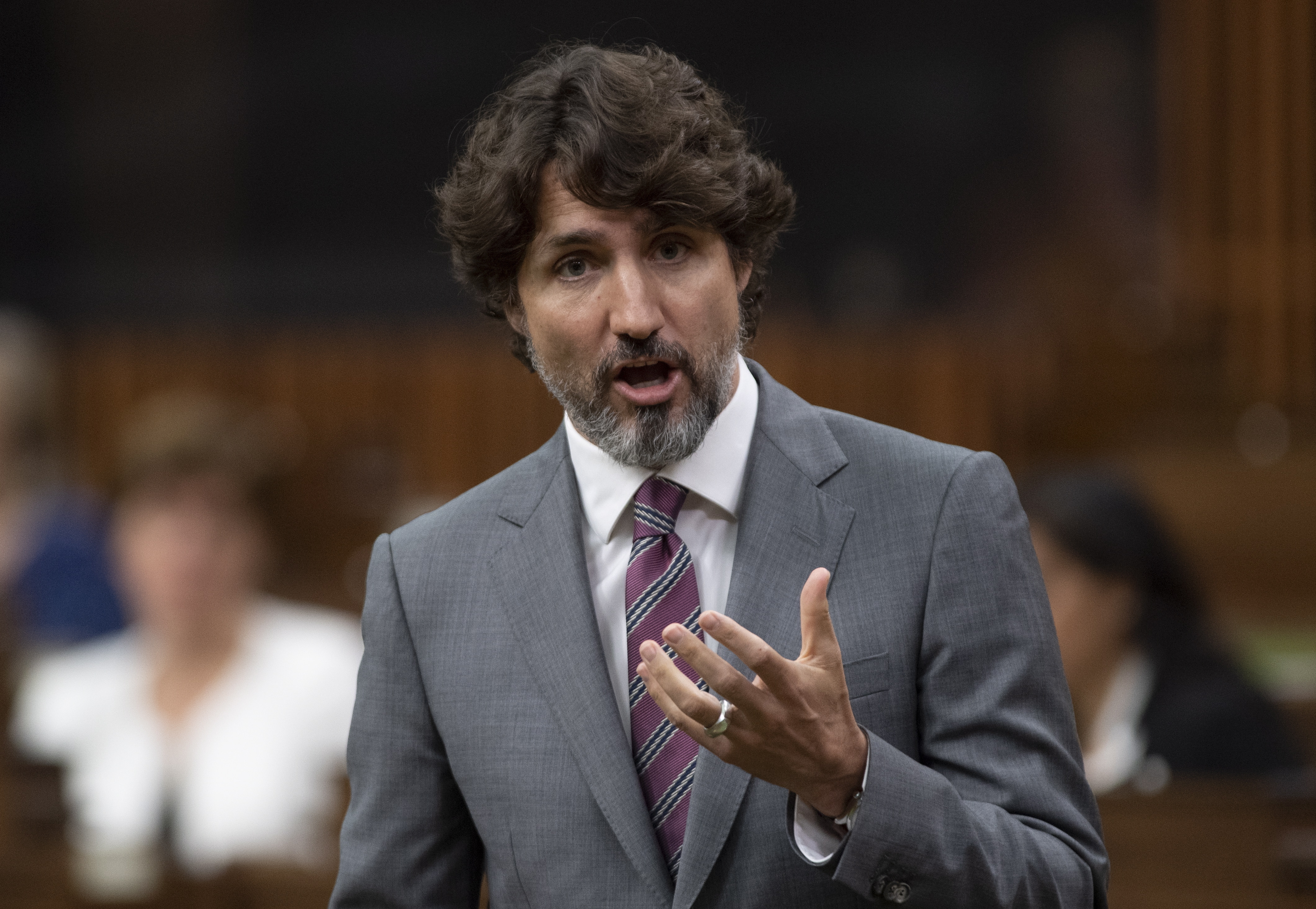 Canadian Prime Minister Justin Trudeau speaks during a sitting of the Special Committee on the COVID-19 Pandemic in the House of Commons, in Ottawa, Wednesday, June 3, 2020. (Adrian Wyld/The Canadian Press via AP)