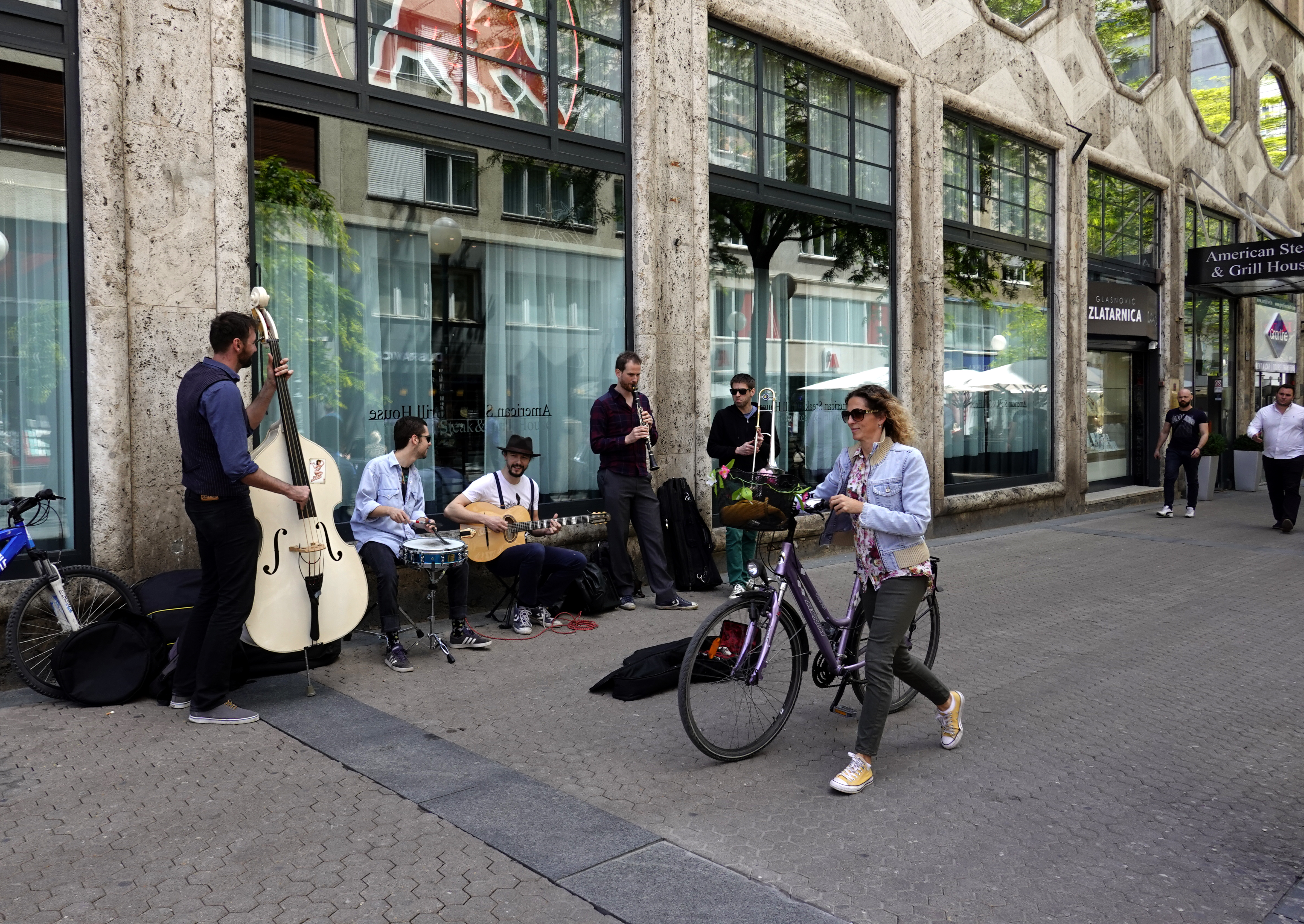 epa08460224 Street singers perform in downtown Zagreb, Croatia, 02 June 2020. After two months lock down caused by coronavirus crisis Croatian citizens were allowed back to normal life without protection masks.  EPA-EFE/ANTONIO BAT