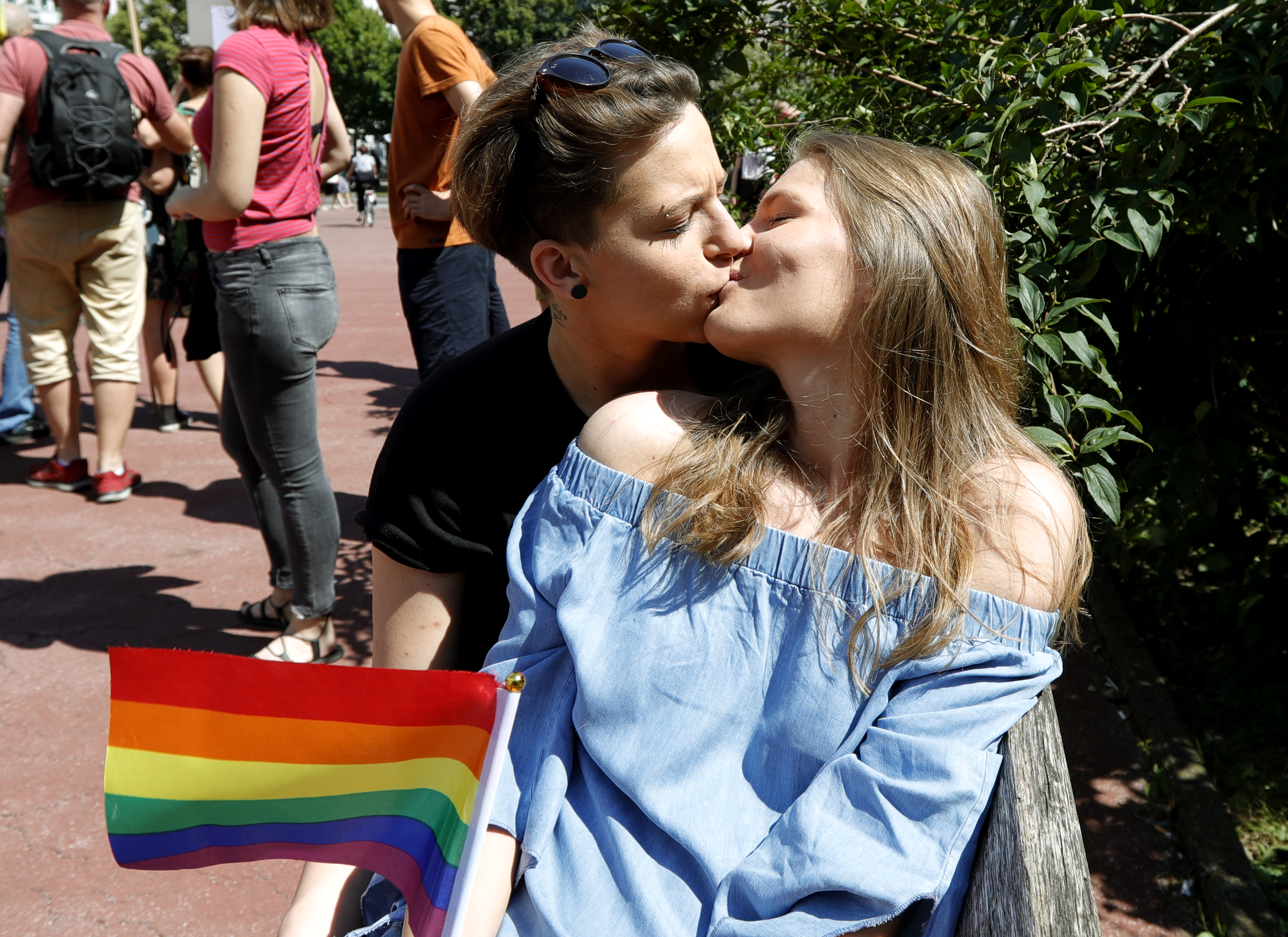 epa06021125 People pose for pictures during the Gay Pride march in Zagreb, Croatia, 10 June 2017.  EPA/ANTONIO BAT