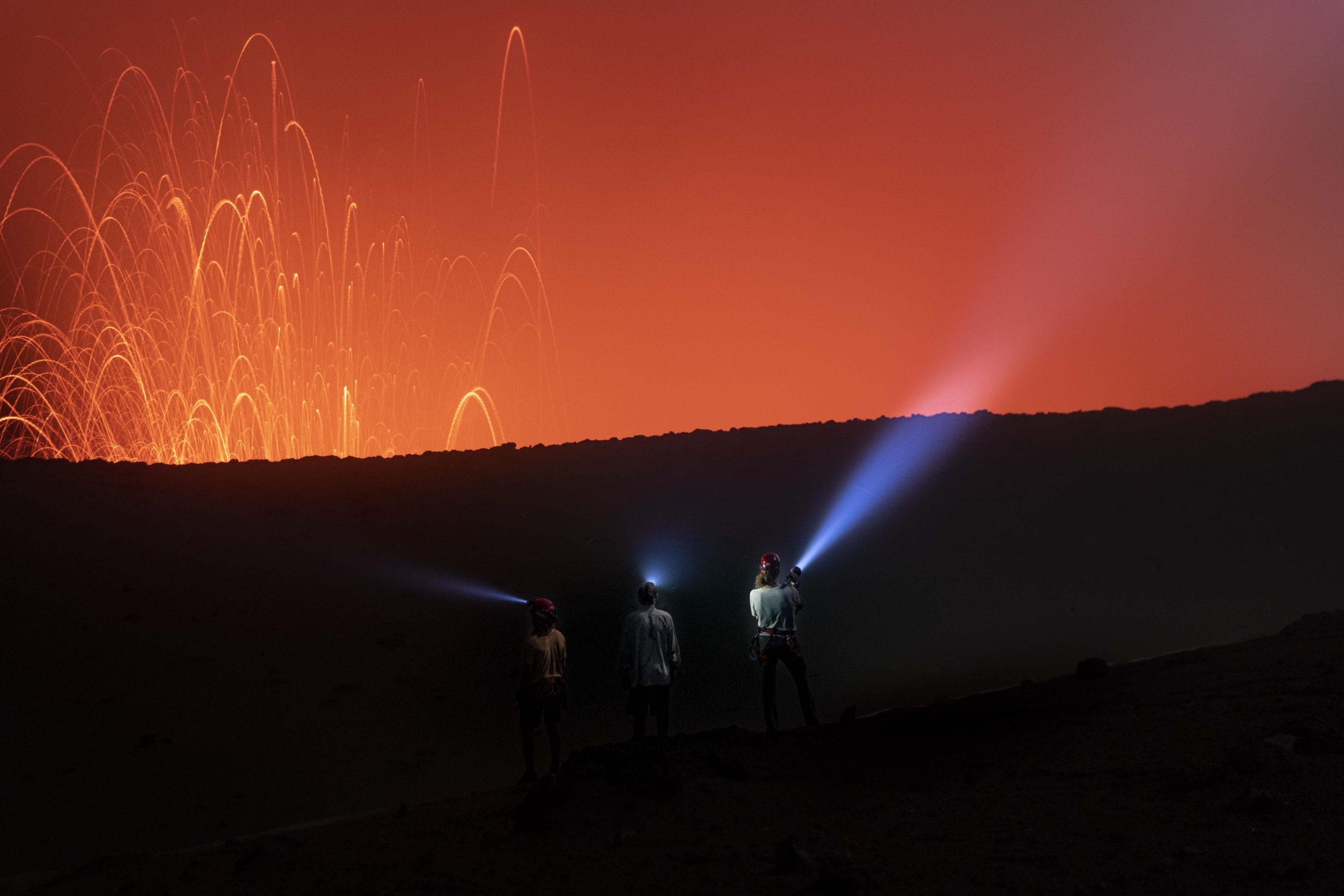 Alexander Schulz, 28, from Germany, and Rafael Bridi, 33, from Brazil crossed the Yasur volcano crater on Tanna Island, Pacific Ocean