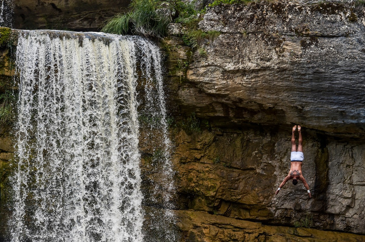 A diver jumps during a high diving competition at the Mirusha waterfalls, near the village of Lapceve, on August 5, 2018.,Image: 381128410, License: Rights-managed, Restrictions: , Model Release: no, Credit line: Armend NIMANI / AFP / Profimedia