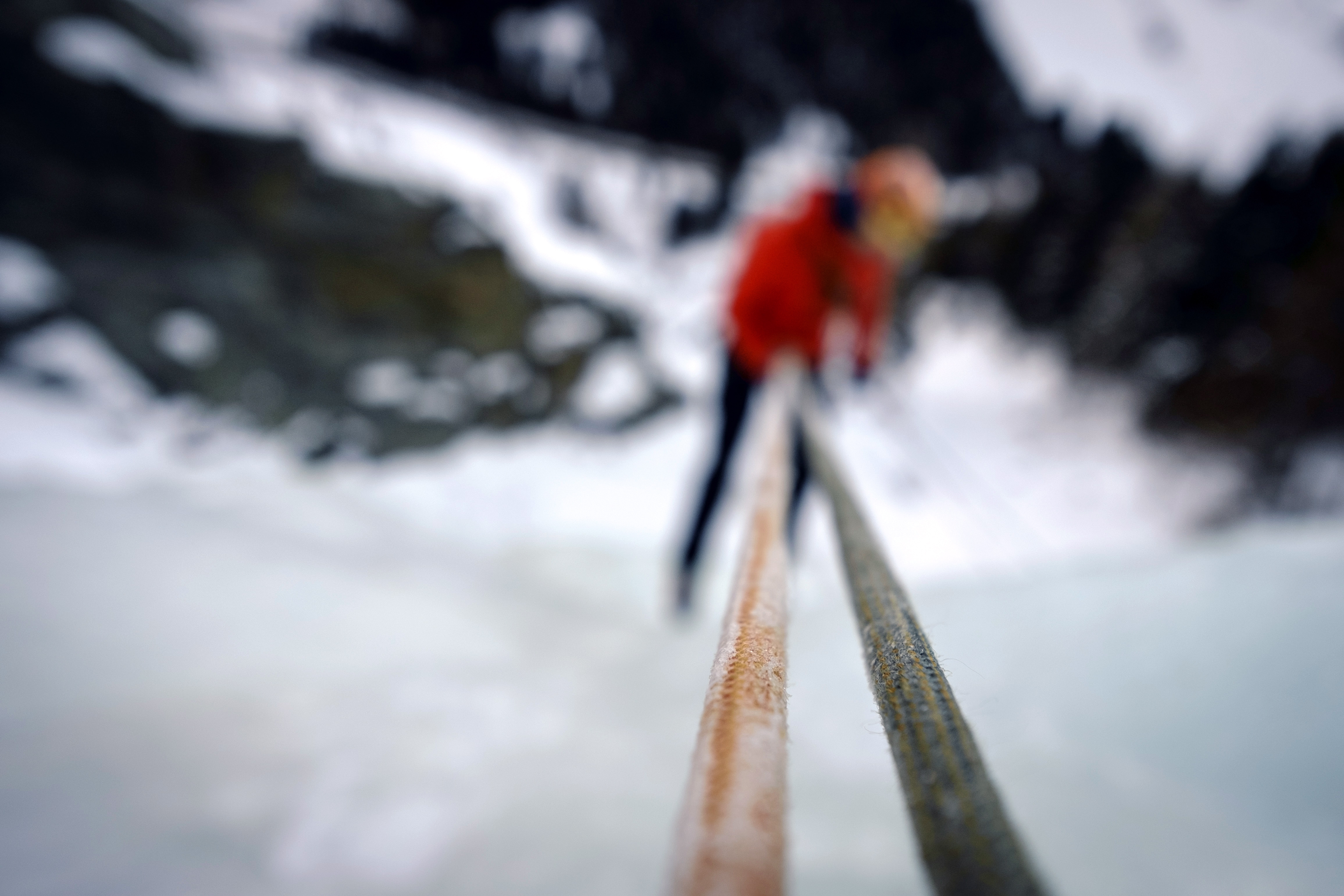 epaselect epa05765220 An ice climber rappels after climbing a frozen waterfall in the Sellrain valley in Tyrol, Austria, 24 January 2017 (Issued 01 February).  EPA/PHILIPP GUELLAND