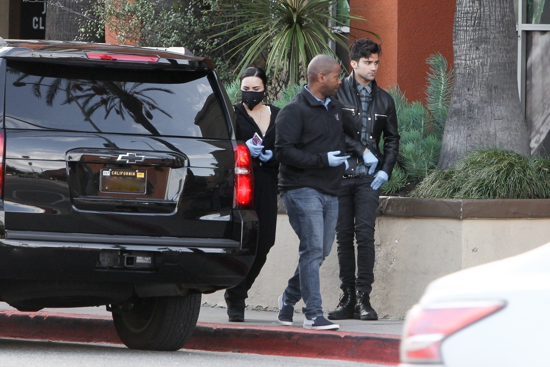 *EXCLUSIVE* Demi Lovato wears a mask stocking up on groceries with new boyfriend Max Ehrich amid coronavirus fears
