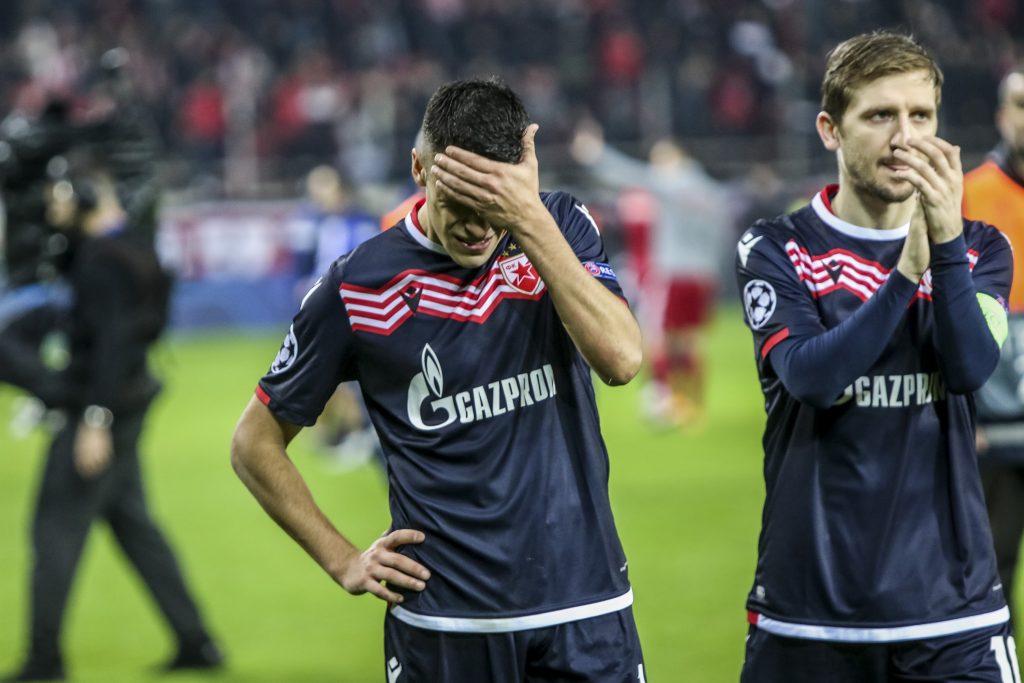 epa08063950 Crvena Zvezda?s players react after the UEFA Champions League Group B soccer match between Olympiacos and Red Star Belgrade held at Georgios Karaiskakis Stadium in Piraeus, Greece, 11 December 2019.  E  EPA-EFE/PANAGIOTIS MOSCHANDREOU