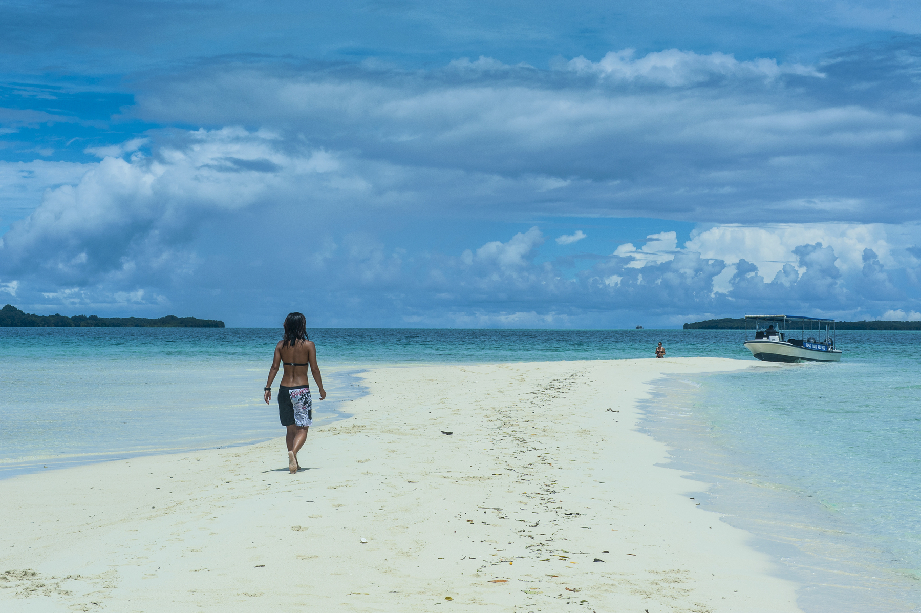 Tourist walking on a sand strip at low tide, Rock Islands, Palau, Image: 213012508, License: Rights-managed, Restrictions: , Model Release: yes, Credit line: Michael Runkel / imageBROKER / Profimedia