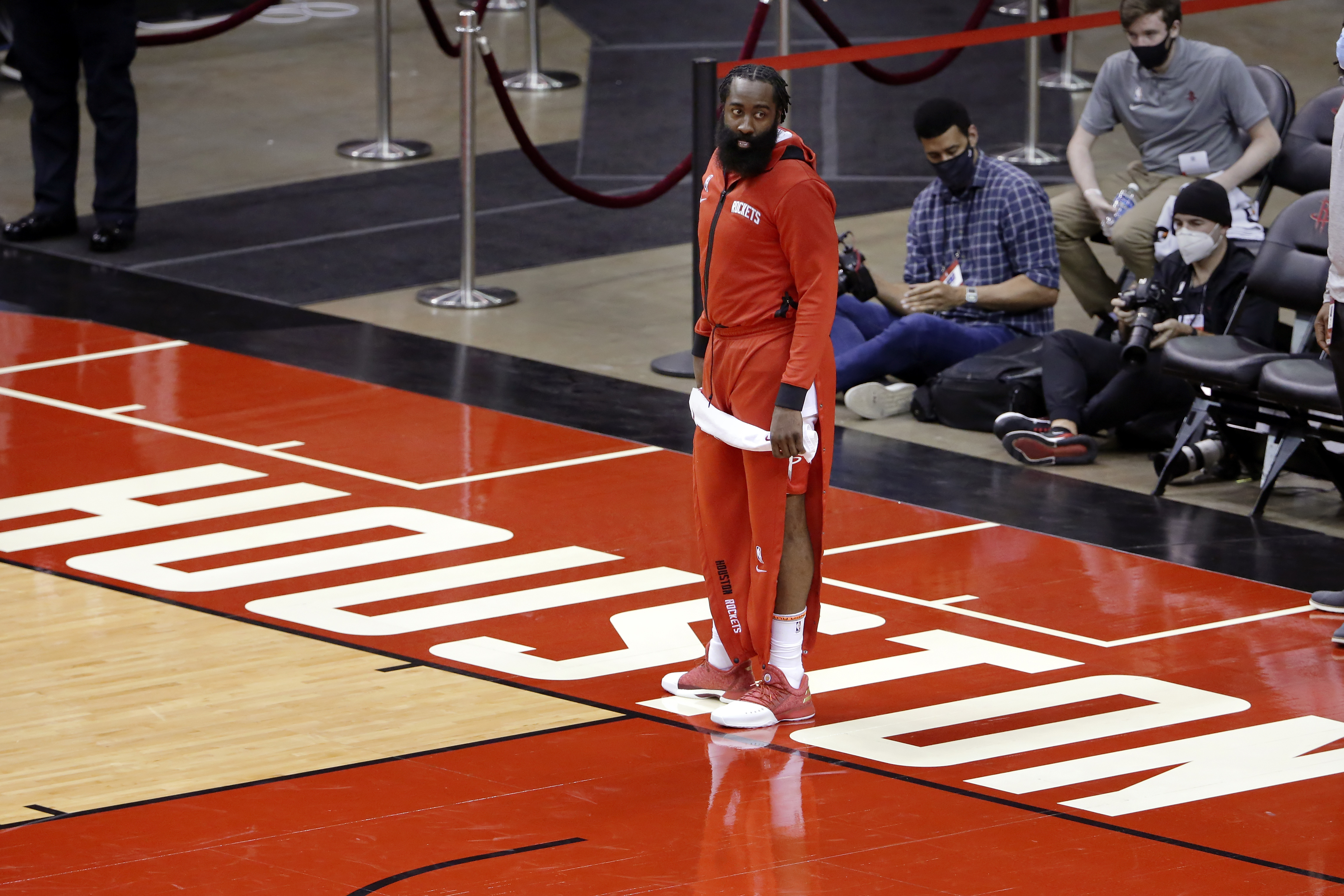 Houston Rockets guard James Harden leaves the court after their win against the San Antonio Spurs after an NBA basketball game Tuesday, Dec. 15, 2020, in Houston. (AP Photo/Michael Wyke)