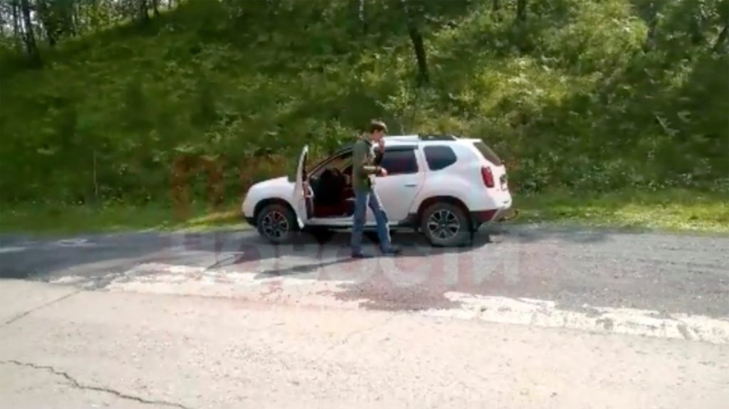 Alexander at his car where his daughter are screaming,Image: 548567626, License: Rights-managed, Restrictions: , Model Release: no, Credit line: Plohie Novosti / East2West News / Profimedia