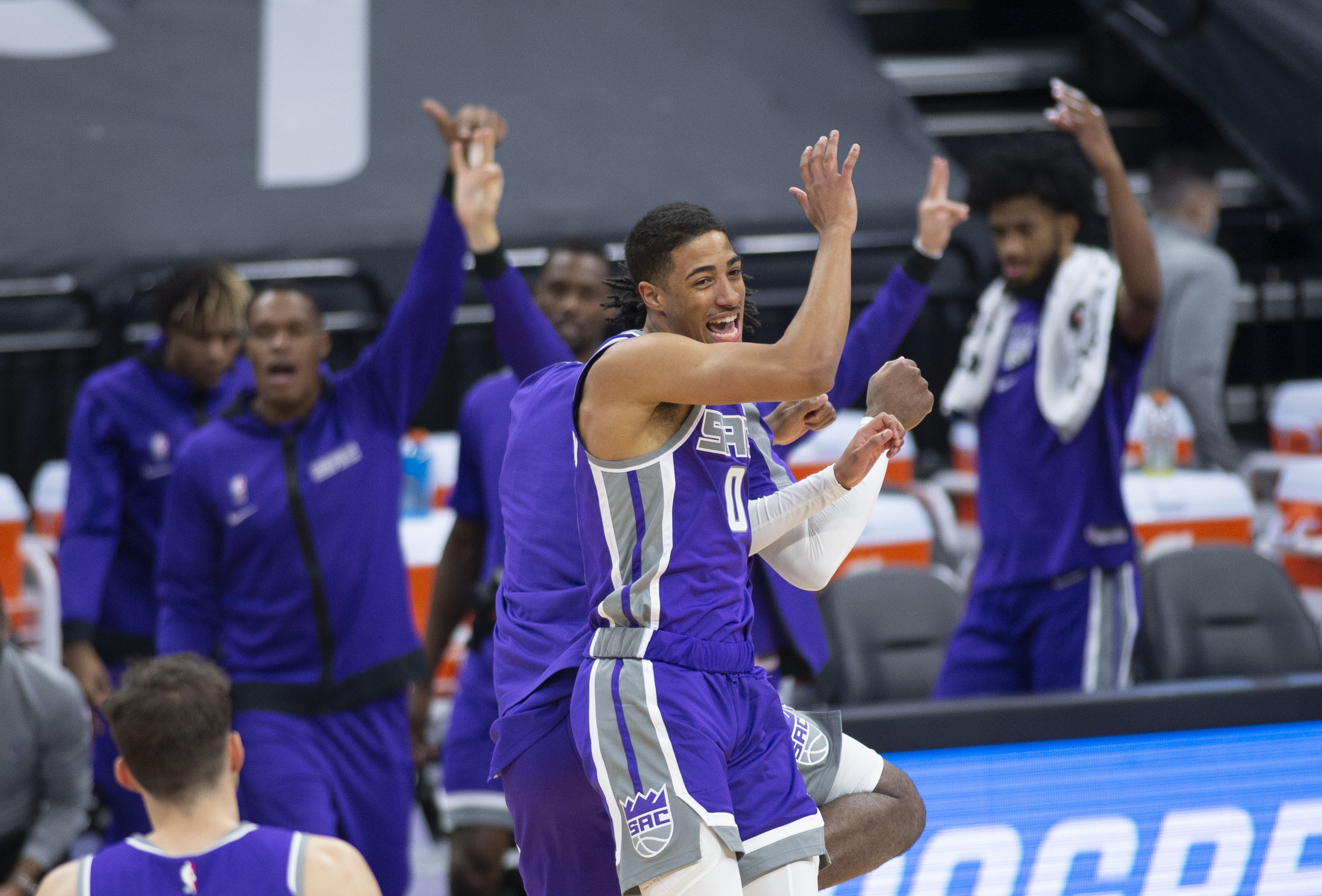Sacramento Kings guard Tyrese Haliburton (0) celebrates a 3-point basket against the Denver Nuggets during the second half of an NBA basketball game in Sacramento, Calif., Tuesday, Dec. 29, 2020. (AP Photo/Hector Amezcua)