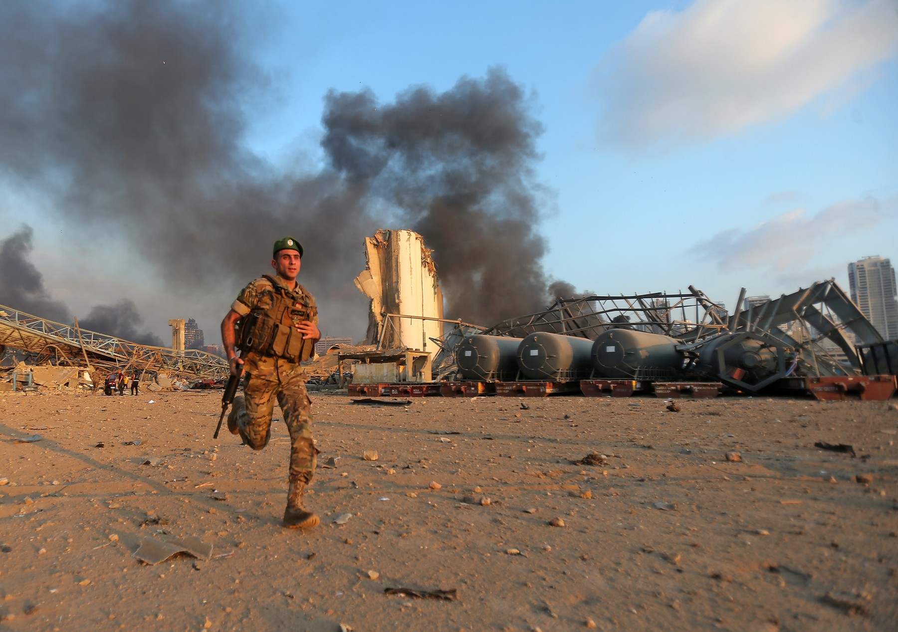 A Lebanese army soldier runs at the scene of an explosion at the port of Lebanon's capital Beirut on August 4, 2020.,Image: 549852025, License: Rights-managed, Restrictions: Graphic Content, Model Release: no, Credit line: STR / AFP / Profimedia