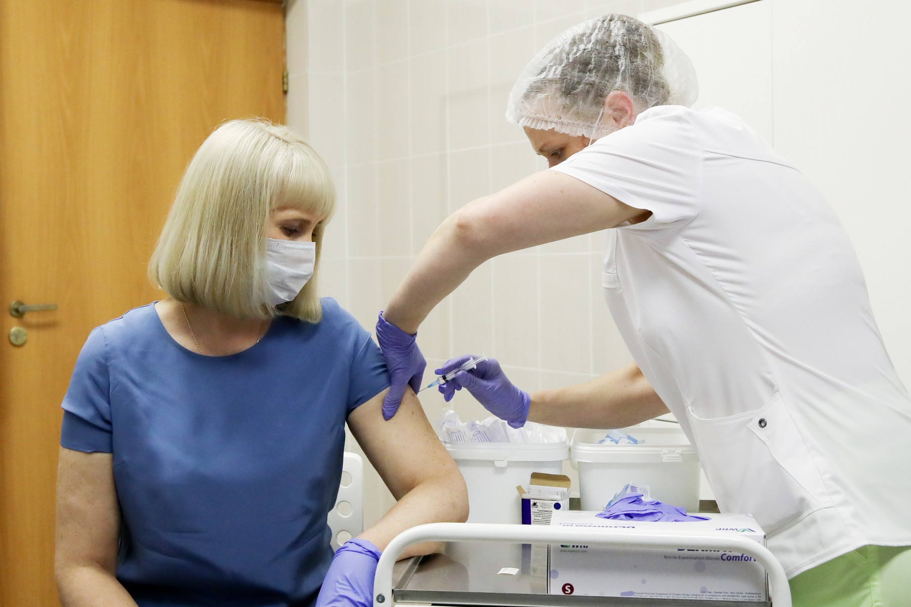 Volunteers take part in post-registration phase trials of Russia's COVID-19 vaccine
