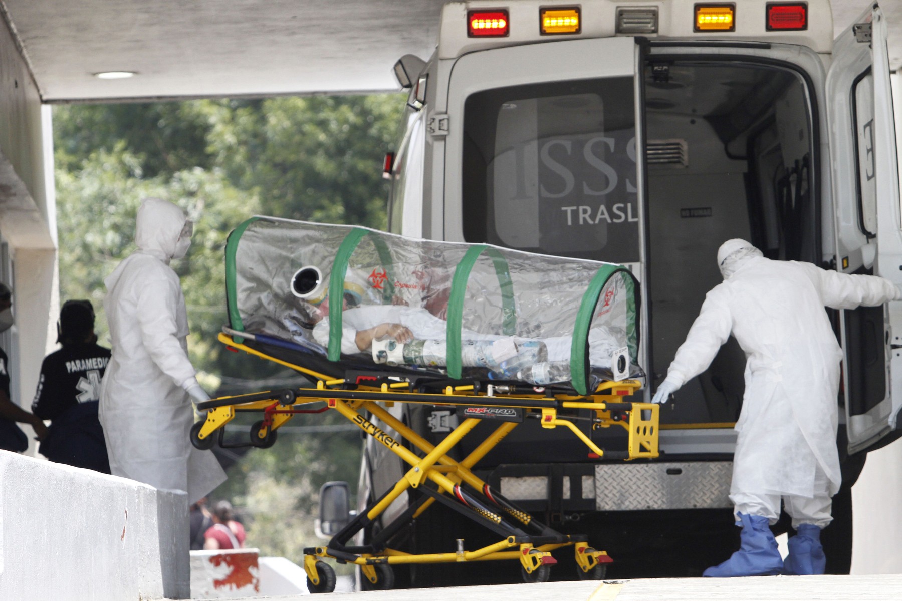 Health Workers Transport a  Suspected Covid-19 Patient