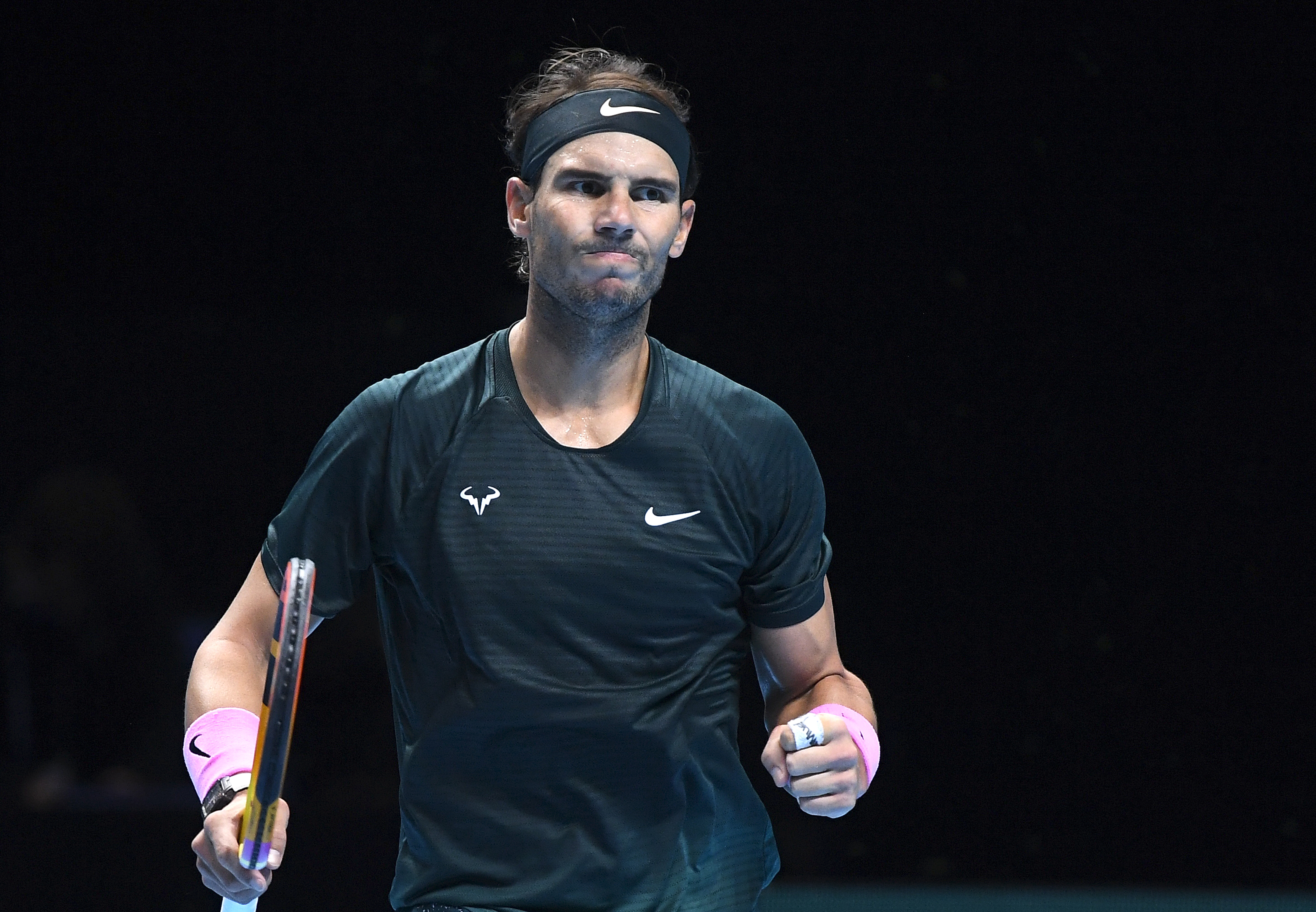 epa08834827 Rafael Nadal of Spain in action against Daniil Medvedev of Russia during their semi final match at the ATP World Tour Finals tennis tournament in London, Britain, 21 November 2020.  EPA-EFE/ANDY RAIN