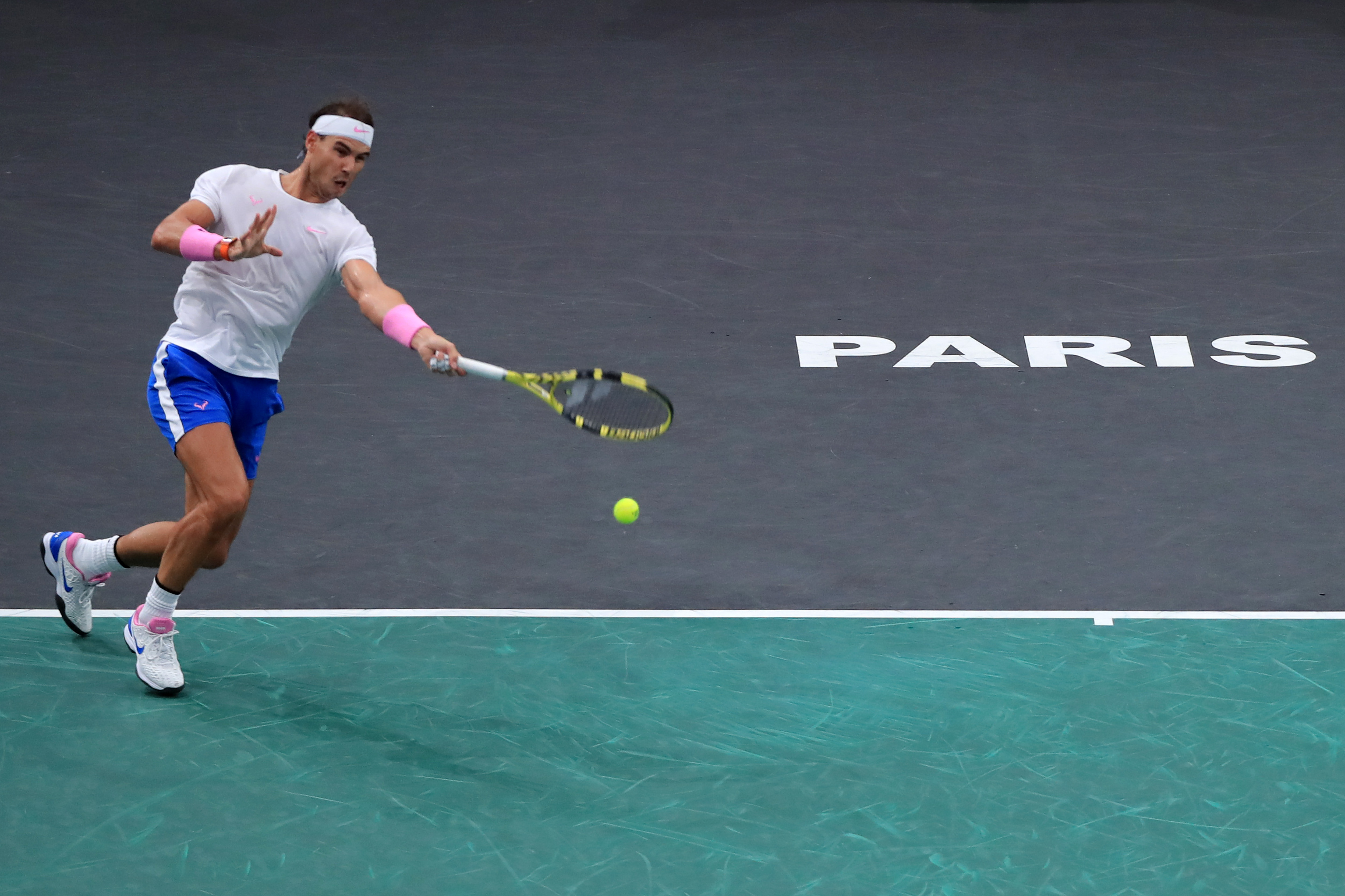 epa07965582 Rafael Nadal of Spain in action during his quarter final match against  Jo-Wilfried Tsonga of France  at the Rolex Paris Masters tennis tournament in Paris, France, 01 November 2019.  EPA-EFE/CHRISTOPHE PETIT TESSON