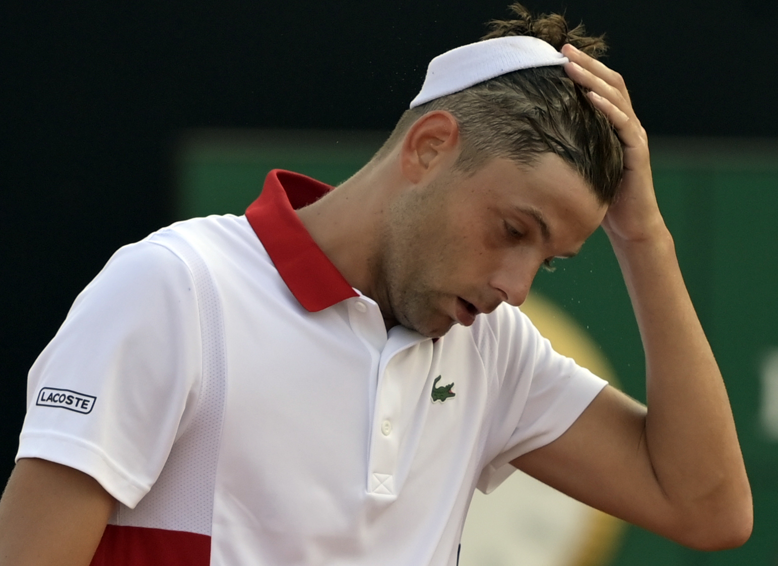 epa08673734 Filip Krajinovic of Serbia reacts during his second round match against Marco Cecchinato of Italy at the Italian Open in Rome, Italy, 16 September 2020.  EPA-EFE/Riccardo Antimiani / POOL