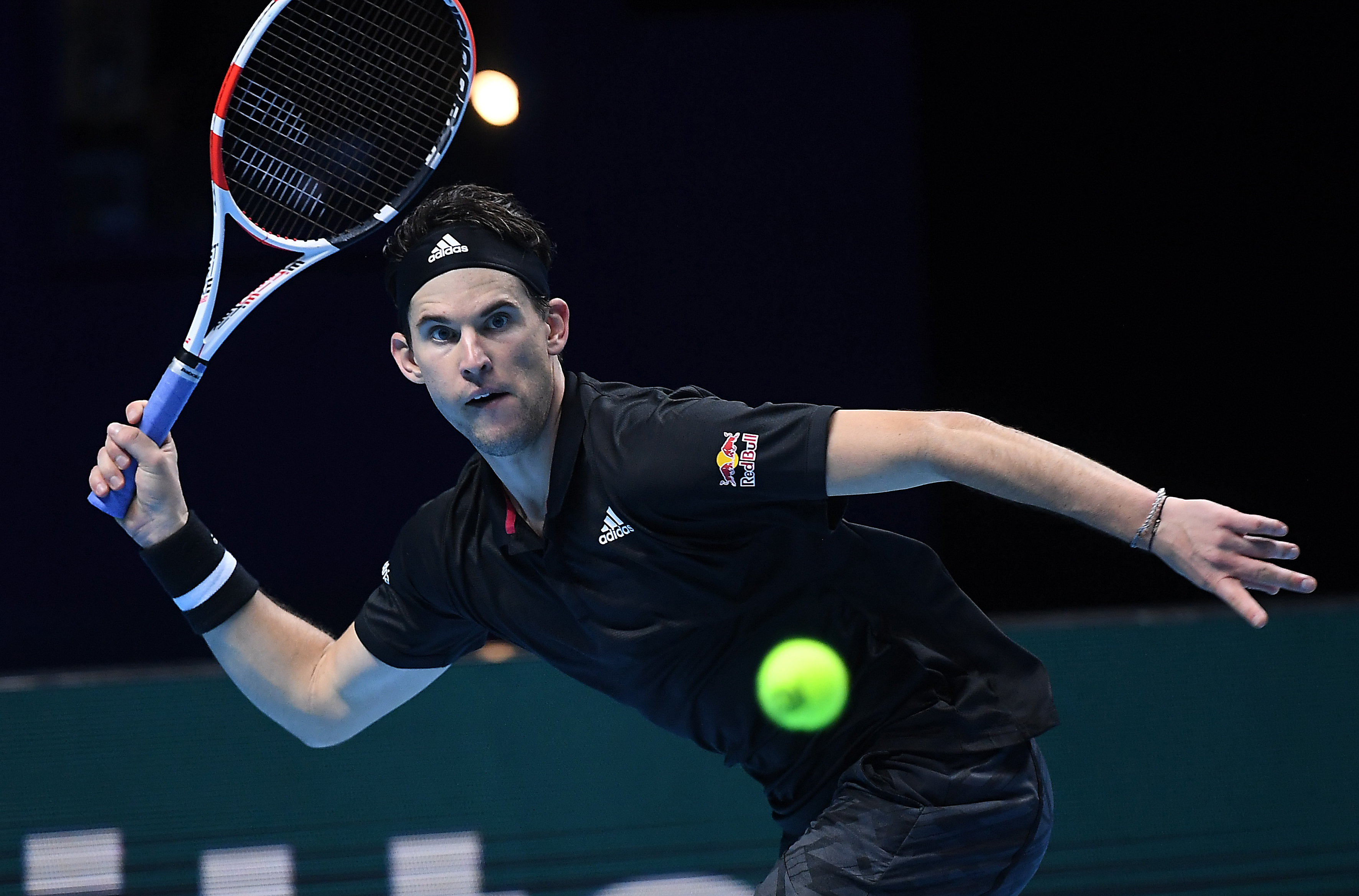 epa08825660 Dominic Thiem of Austria in action during his group stage match against Rafael Nadal of Spain at the ATP Finals in London, Britain, 17 November 2020.  EPA-EFE/ANDY RAIN