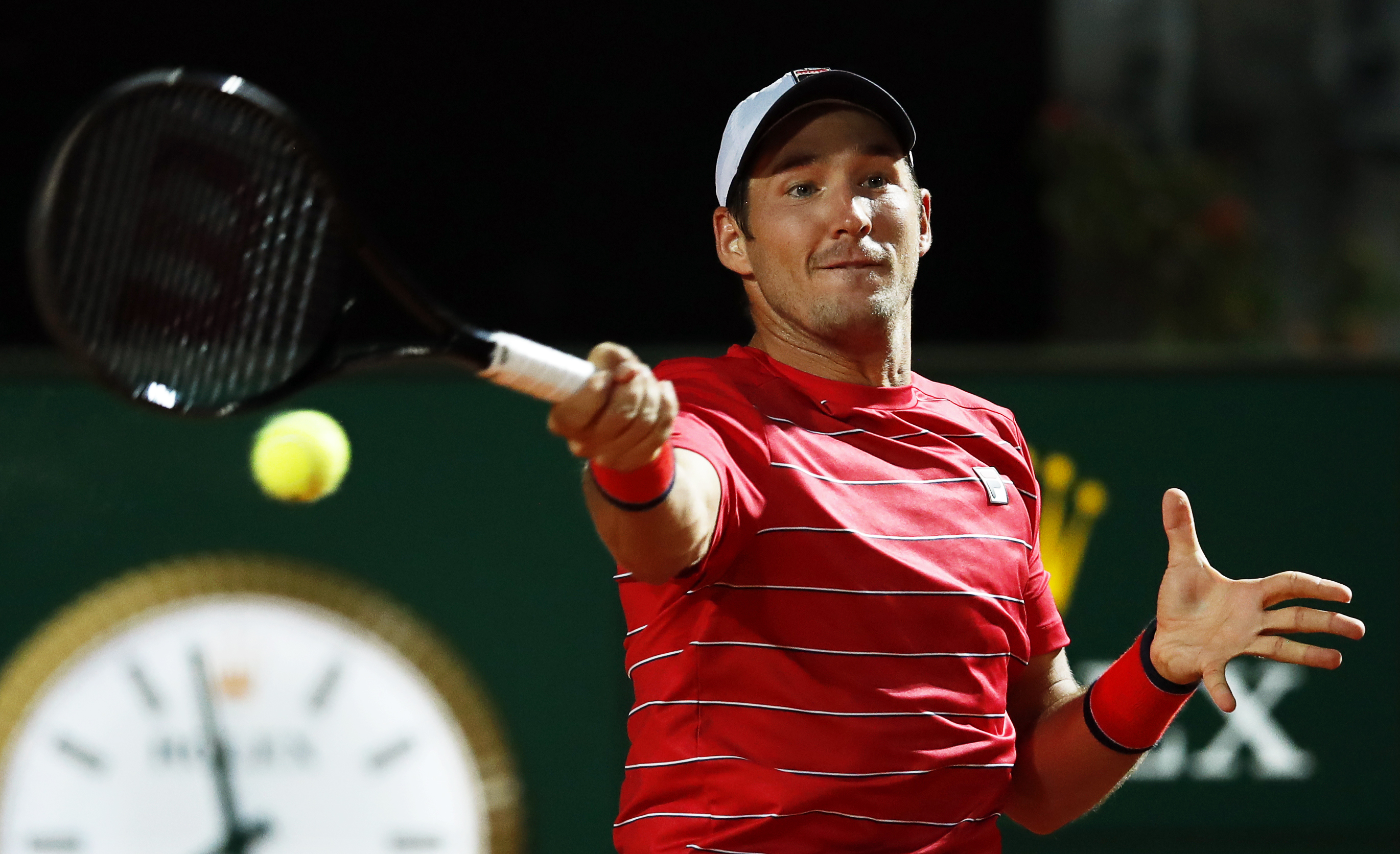 epa08679382 Dusan Lajovic of Serbia in action against Rafael Nadal of Spain during their men's singles third round match at the Italian Open tennis tournament in Rome, Italy, 18 September 2020.  EPA-EFE/Clive Brunskill / POOL