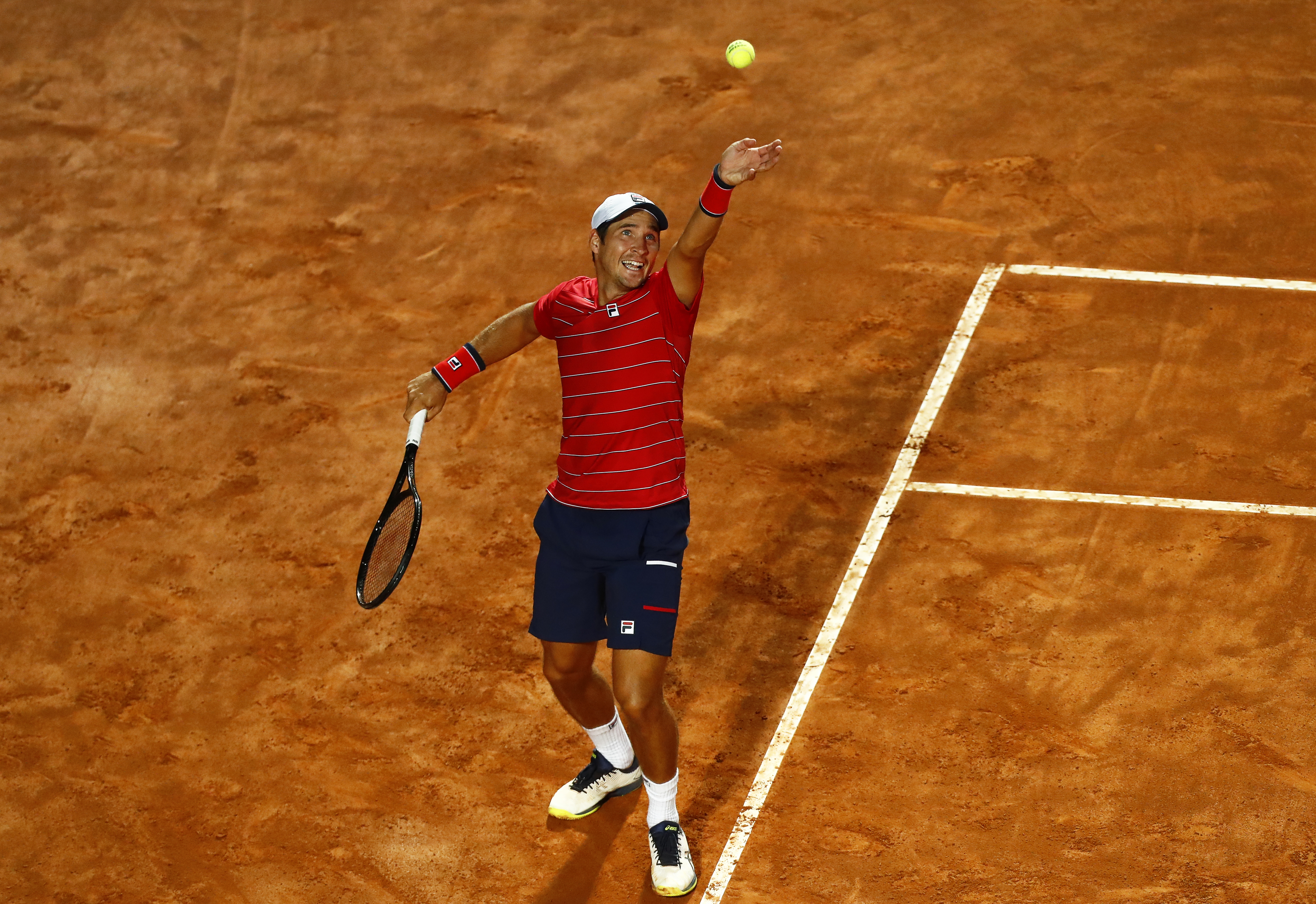 epa08679381 Dusan Lajovic of Serbia in action against Rafael Nadal of Spain during their men's singles third round match at the Italian Open tennis tournament in Rome, Italy, 18 September 2020.  EPA-EFE/Angelo Carconi / POOL