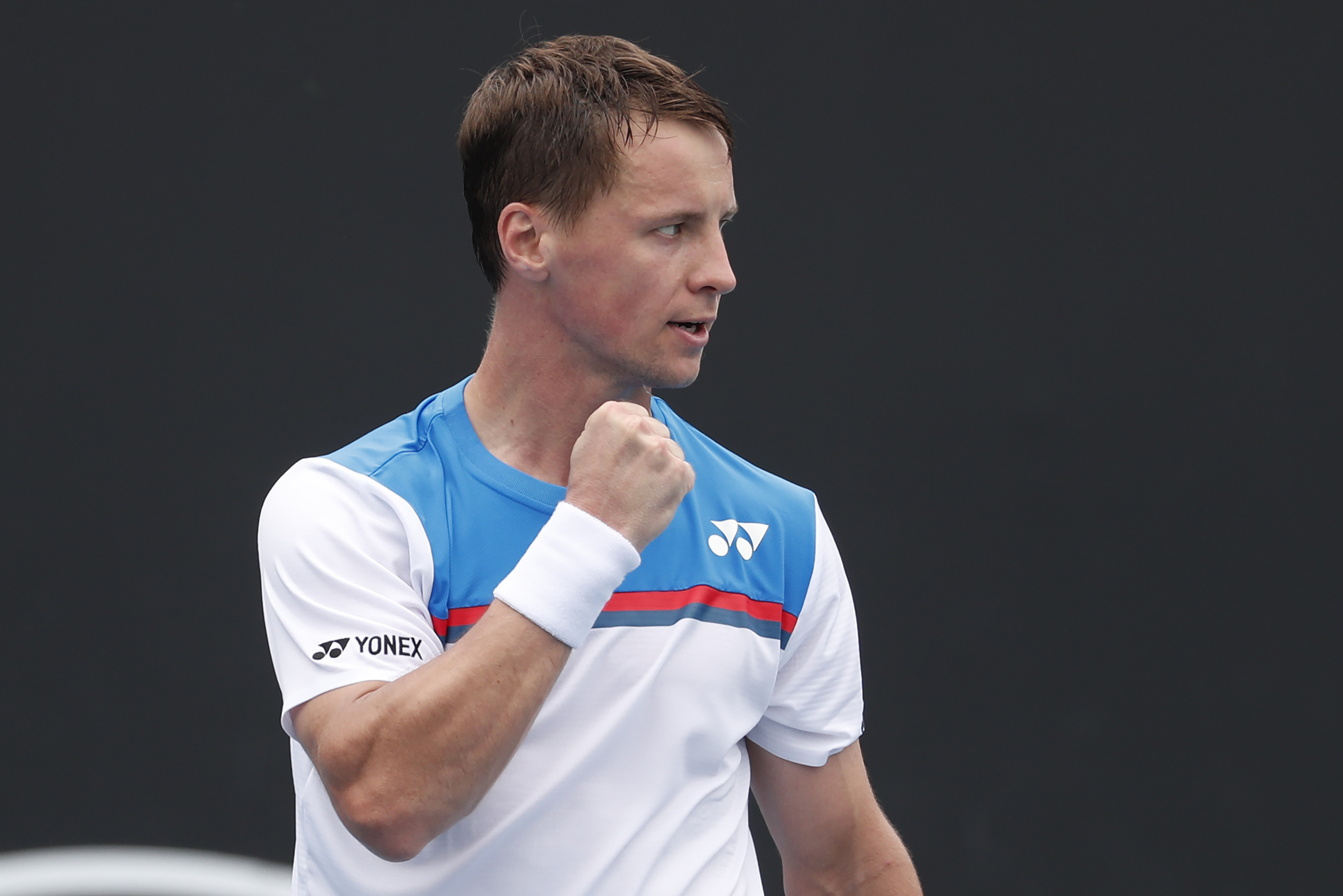 epa08143145 Ricardas Berankis of Lithuania celebrates winning his men's singles first round match against Roberto Carballes Baena of Spain at the Australian Open Grand Slam tennis tournament in Melbourne, Australia, 20 January 2020. EPA-EFE/ROMAN PILIPEY