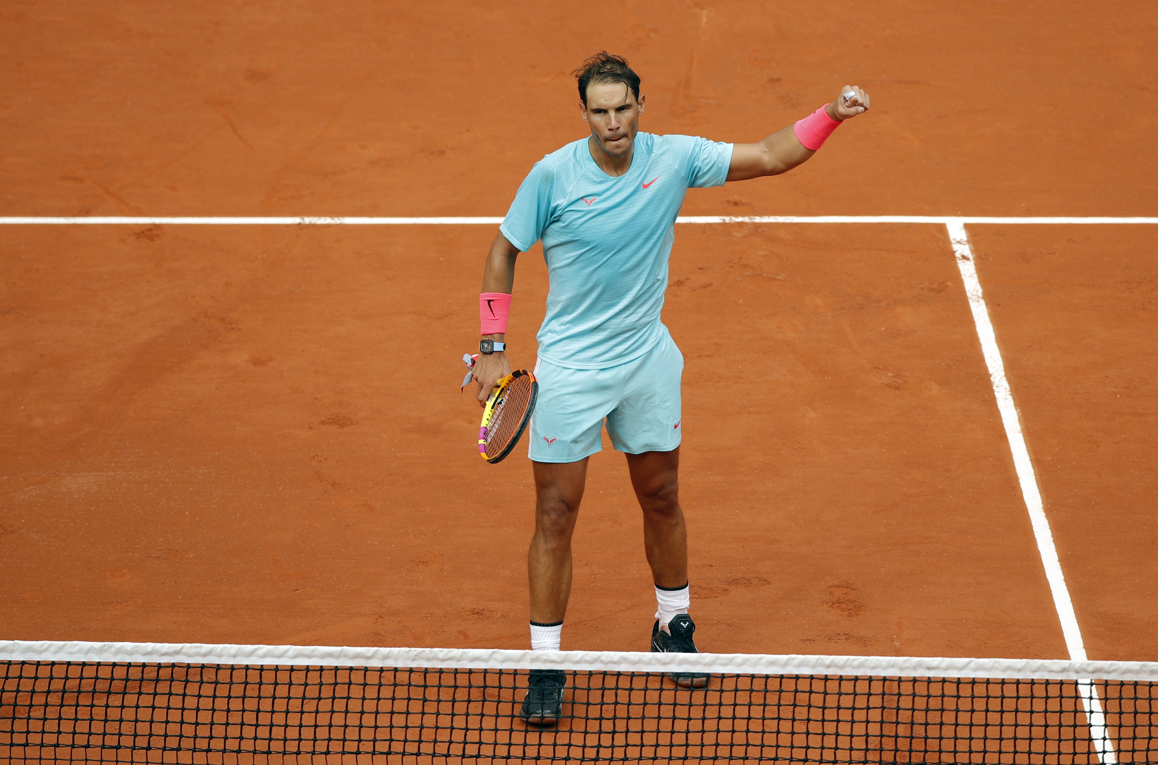 epa08708679 Rafael Nadal of Spain reacts after winning against Mackenzie McDonald of the USA their men?s second round match during the French Open tennis tournament at Roland ?Garros in Paris, France, 30 September 2020.  EPA-EFE/YOAN VALAT