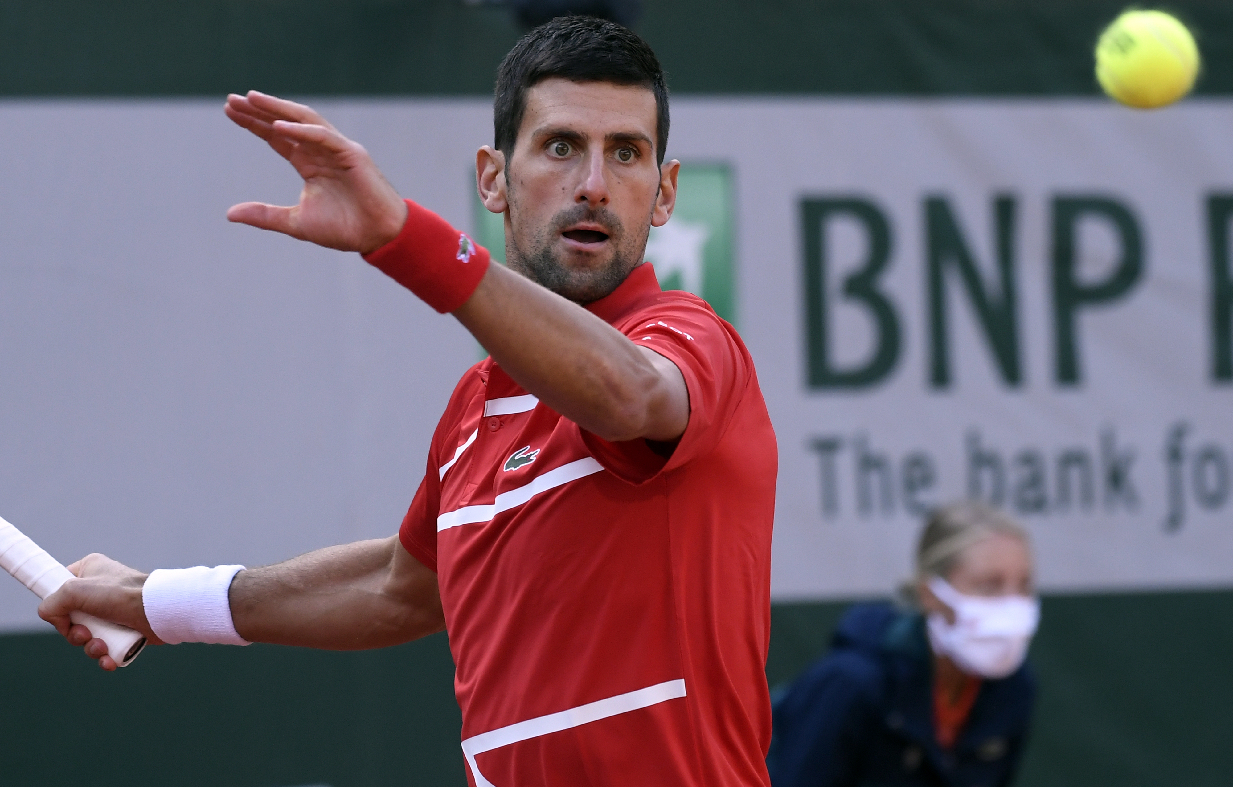 epa08712115 Novak Djokovic of Serbia in action against Ricardas Berankis of Lithuania during their men?s second round match during the French Open tennis tournament at Roland ?Garros in Paris, France, 01 October 2020.  EPA-EFE/JULIEN DE ROSA