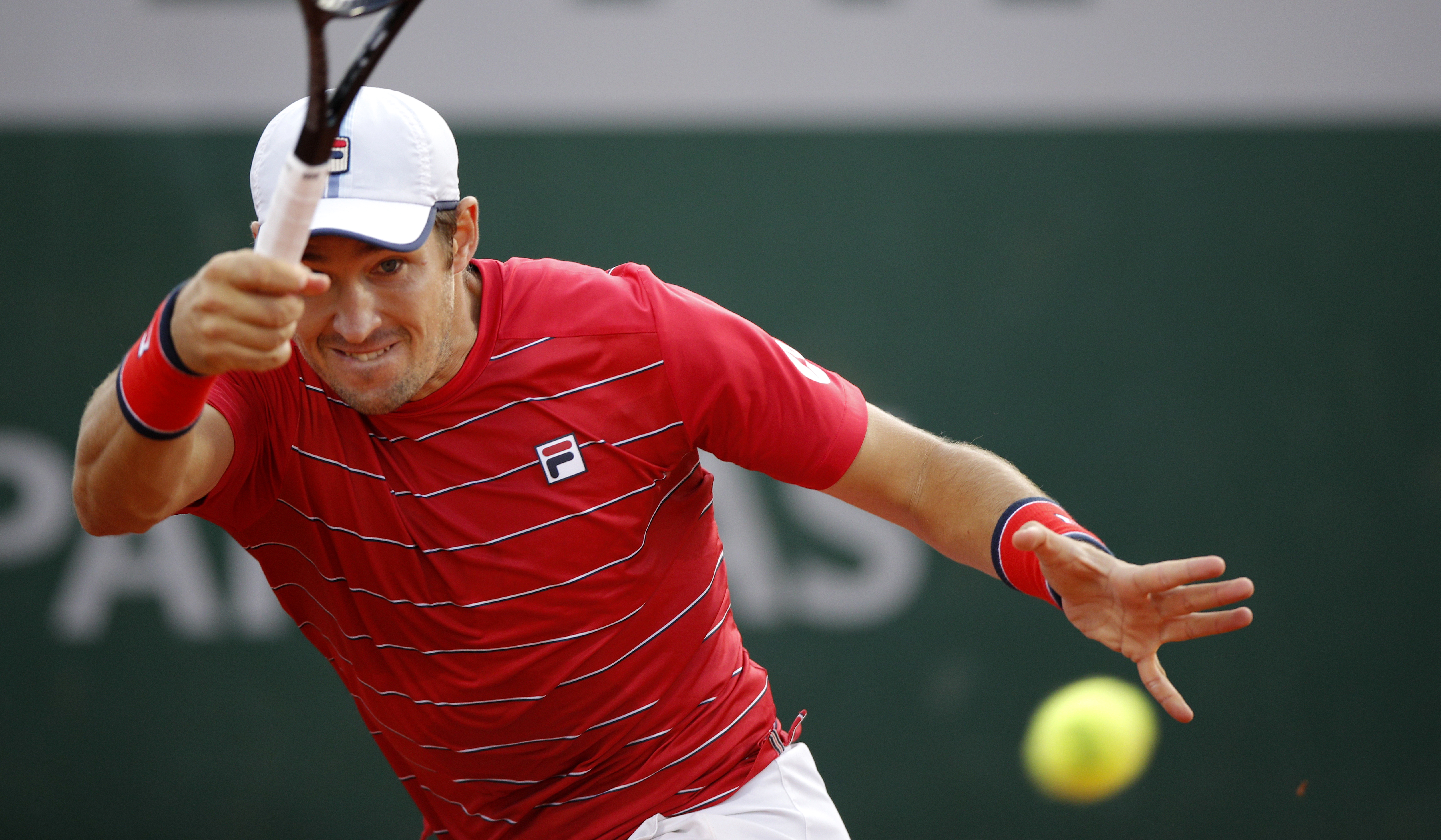 epa08713043 Dusan Lajovic of Serbia hits a forehand during his second round match against Kevin Anderson of South Africa at the French Open tennis tournament at Roland Garros in Paris, France, 01 October 2020  EPA-EFE/YOAN VALAT