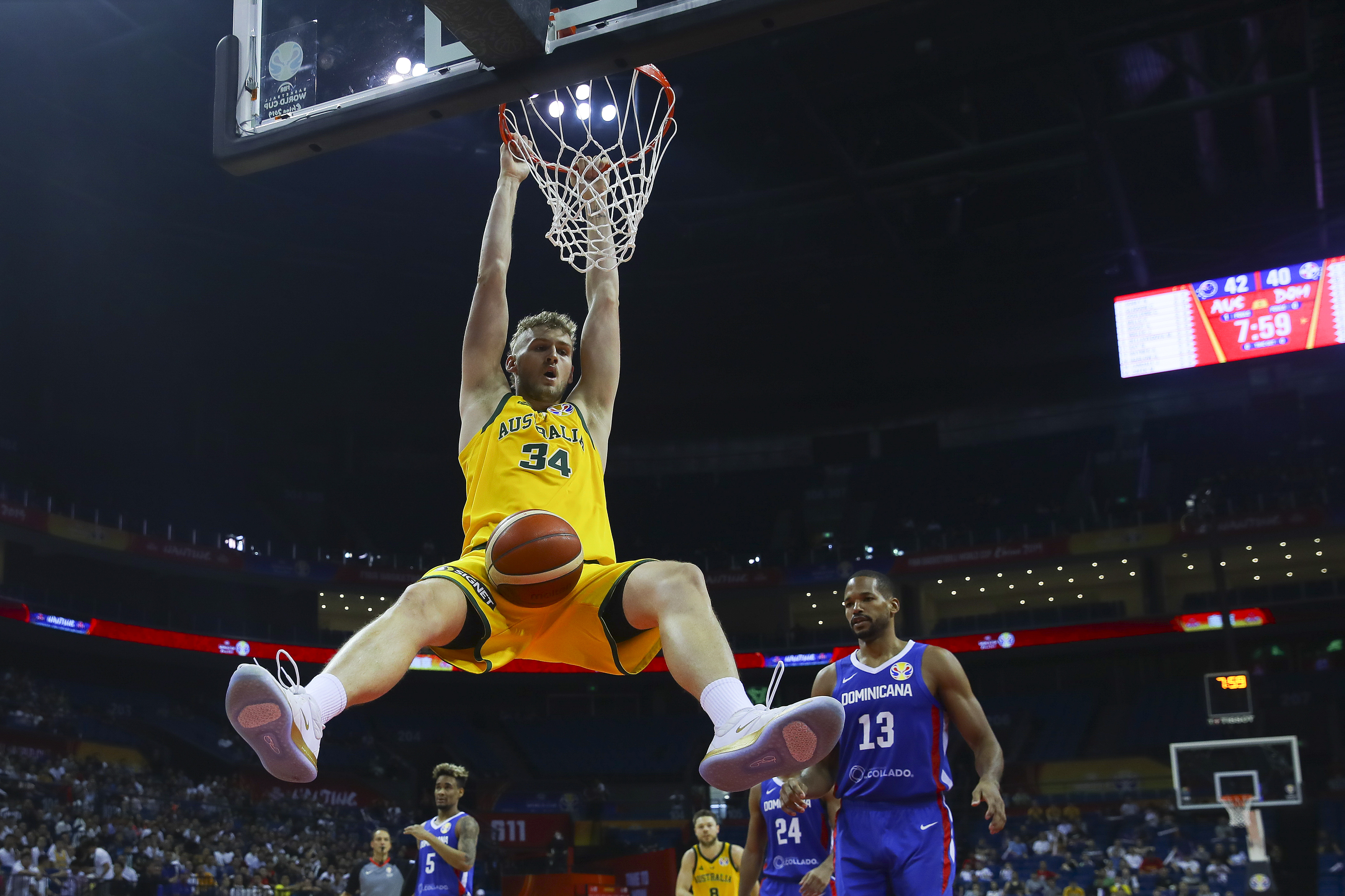 epa07824827 Jock Landale (L) of Australia in action against  Eulis Baez (R) of Dominican Republic during the FIBA Basketball World Cup 2019 match between Australia and Dominican Republic in Nanjing, China, 07 September 2019.  EPA-EFE/FAZRY ISMAIL