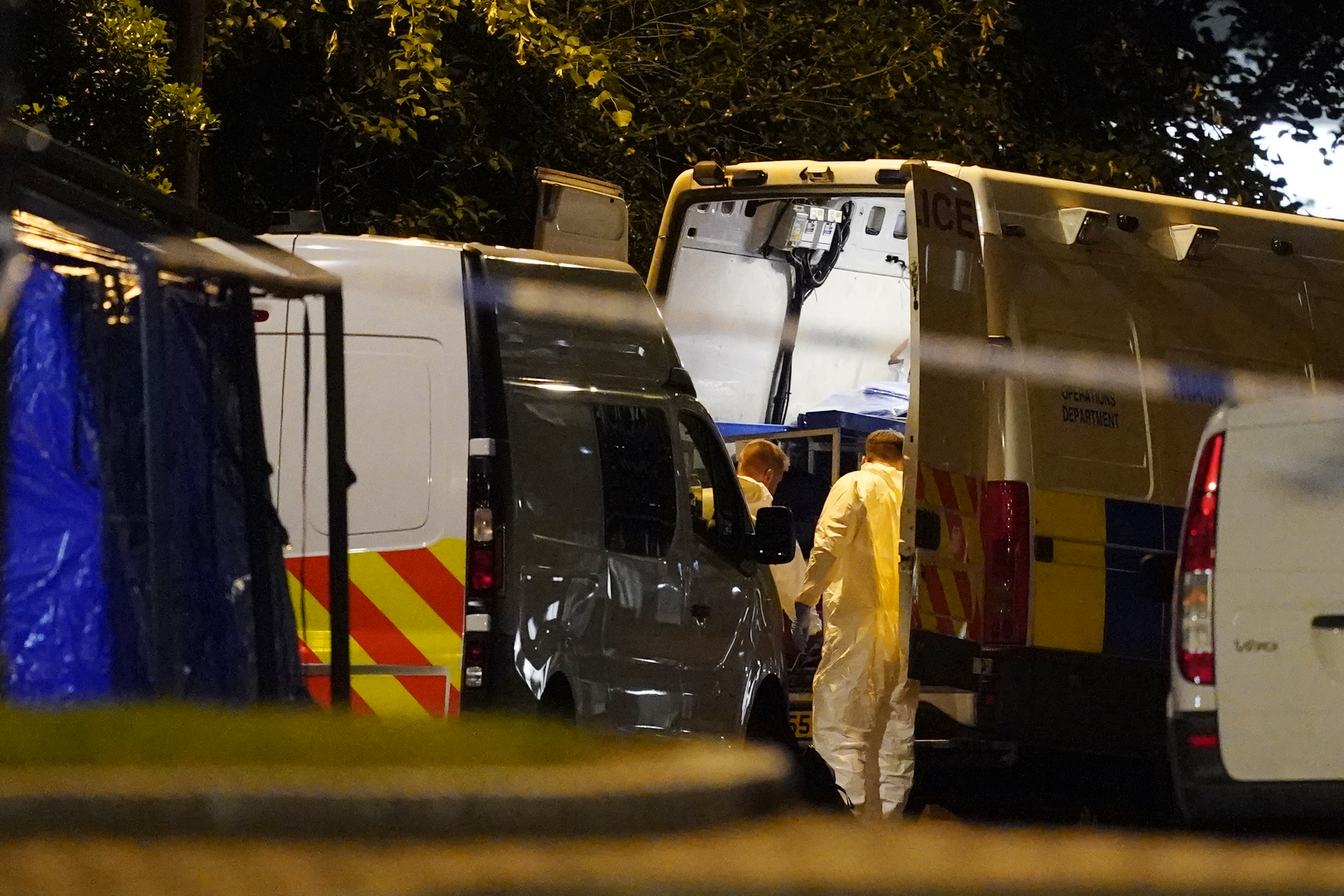 epa08499223 Forensic officers work close to the scene where reports state that three people were stabbed in Forbury Gardens, Reading, Britain, 21 June 2020.  EPA-EFE/WILL OLIVER