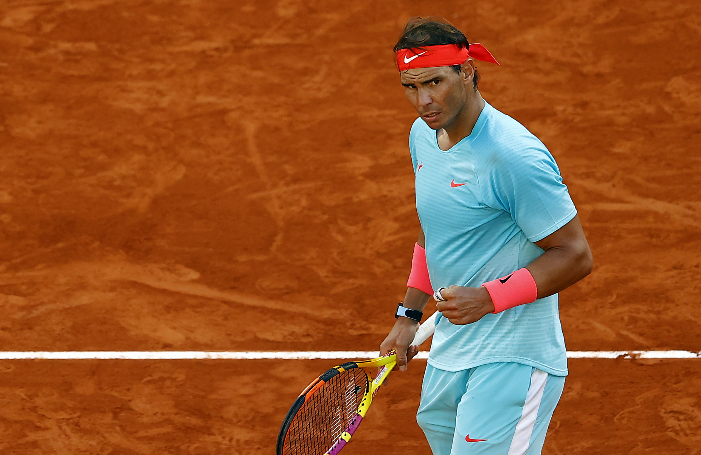 epa08732395 Rafael Nadal of Spain reacts as he plays Diego Schwartzman of Argentina during their men?s semi final match during the French Open tennis tournament at Roland ?Garros in Paris, France, 09 October 2020.  EPA-EFE/IAN LANGSDON