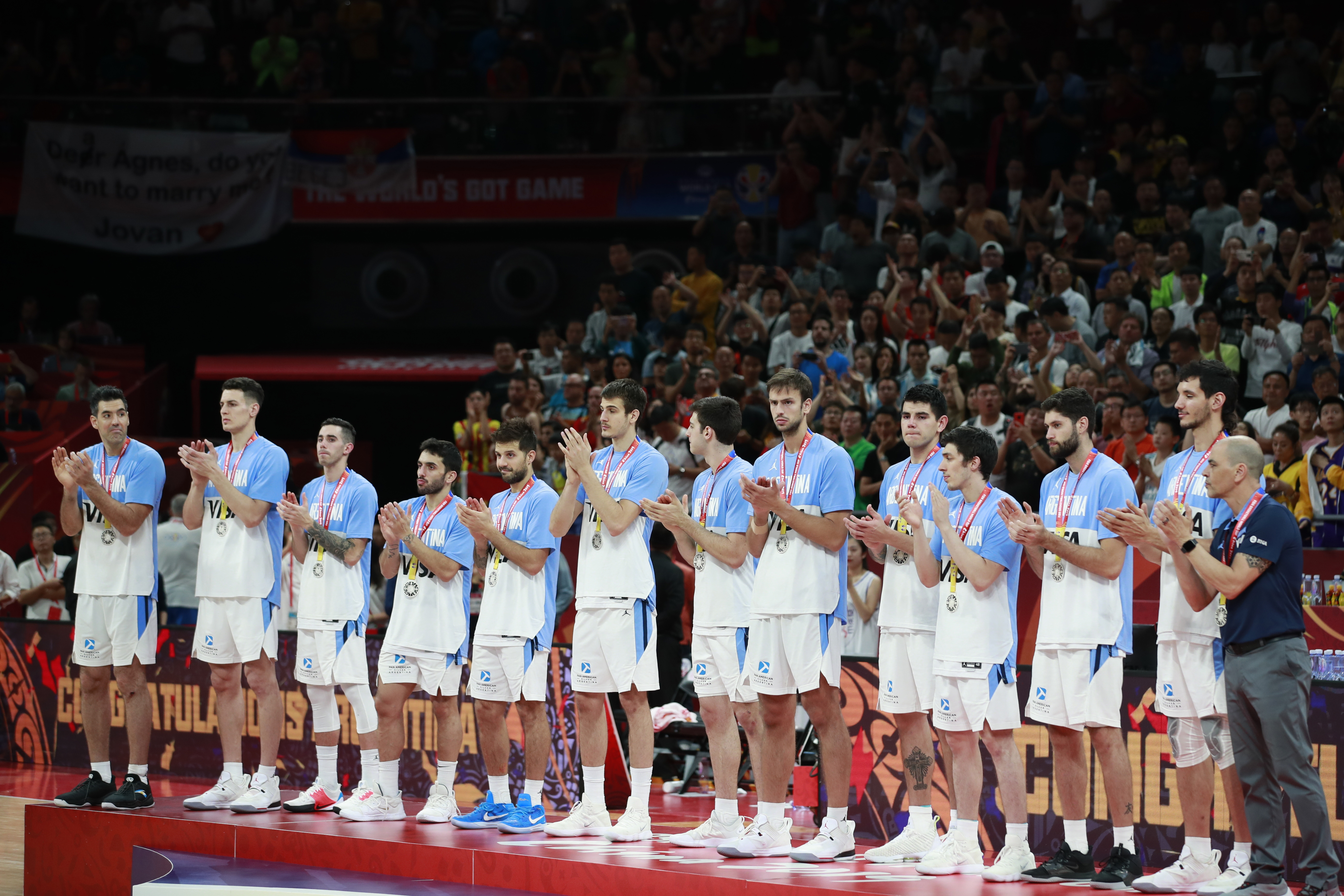 epa07844984 Players of Argentina celebrate their silver medals after losing against Spain in the FIBA Basketball World Cup 2019 final, in Beijing, China, 15 September 2019.  EPA-EFE/HOW HWEE YOUNG