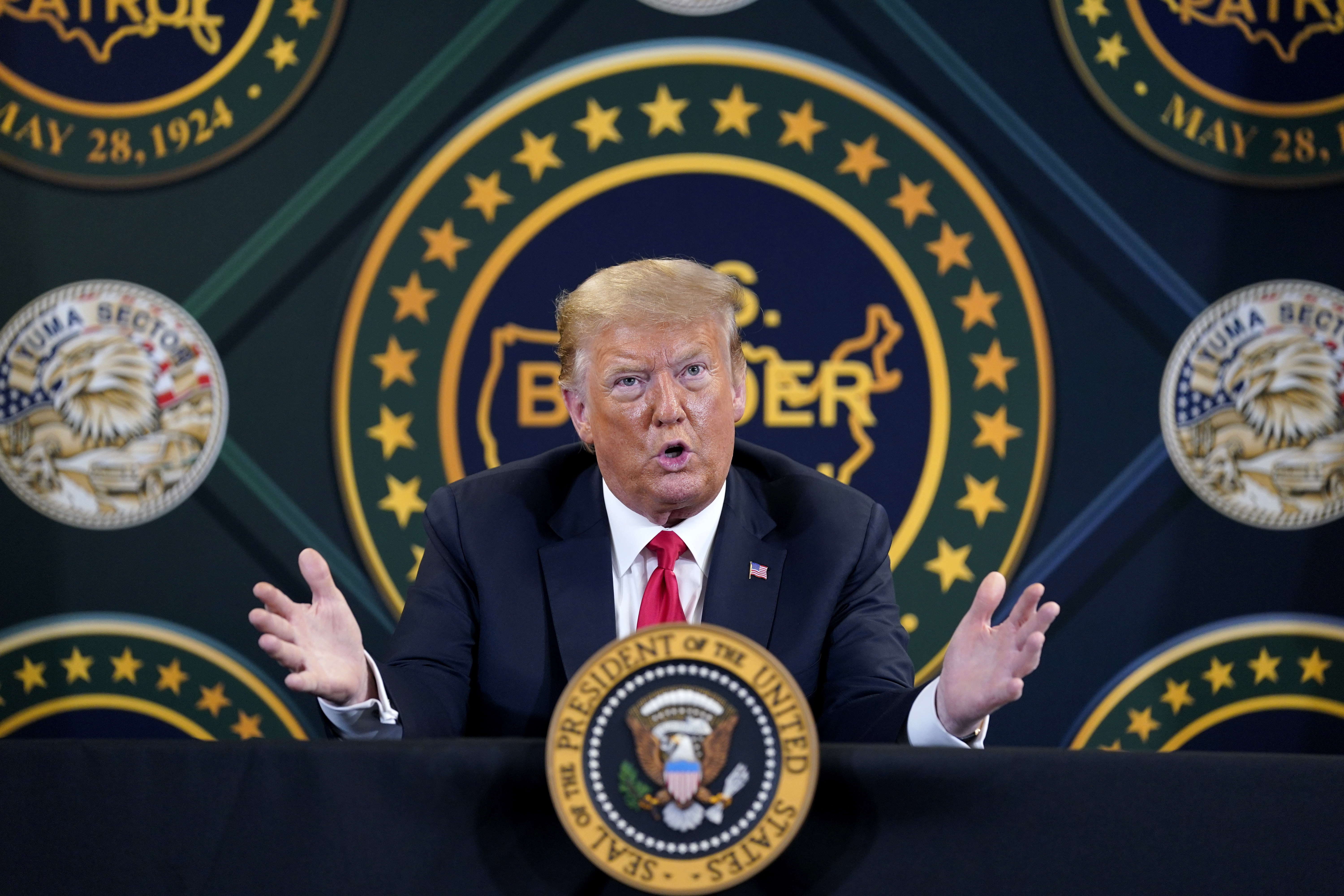 President Donald Trump participates in a border security briefing at United States Border Patrol Yuma Station, Tuesday, June 23, 2020, in Yuma, Ariz. (AP Photo/Evan Vucci)