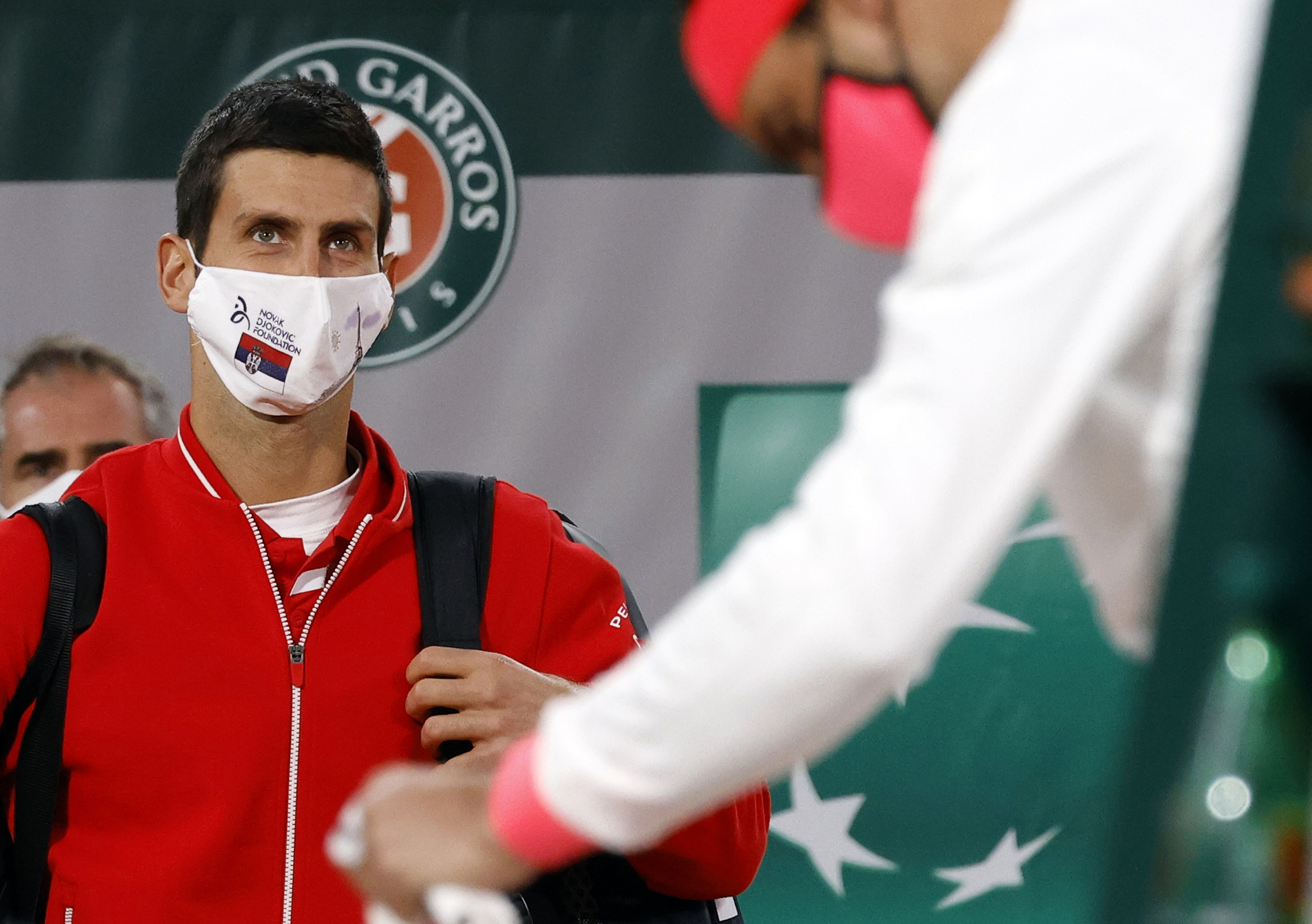 epa08735440 Novak Djokovic of Serbia arrives to play Rafael Nadal of Spain in their men?s final match during the French Open tennis tournament at Roland ?Garros in Paris, France, 11 October 2020.  EPA-EFE/YOAN VALAT