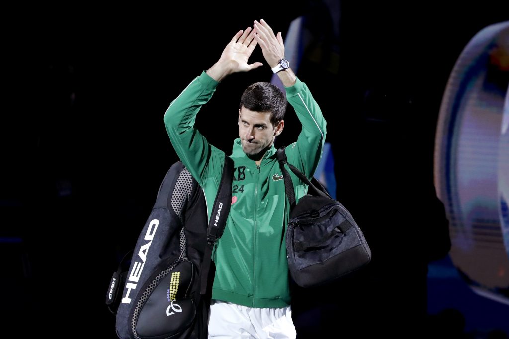 epa08187810 Novak Djokovic of Serbia leaves the court after winning his men's singles final match against Dominic Thiem of Austria at the Australian Open Grand Slam tennis tournament in Melbourne, Australia, 02 February 2020. EPA-EFE/FRANCIS MALASIG
