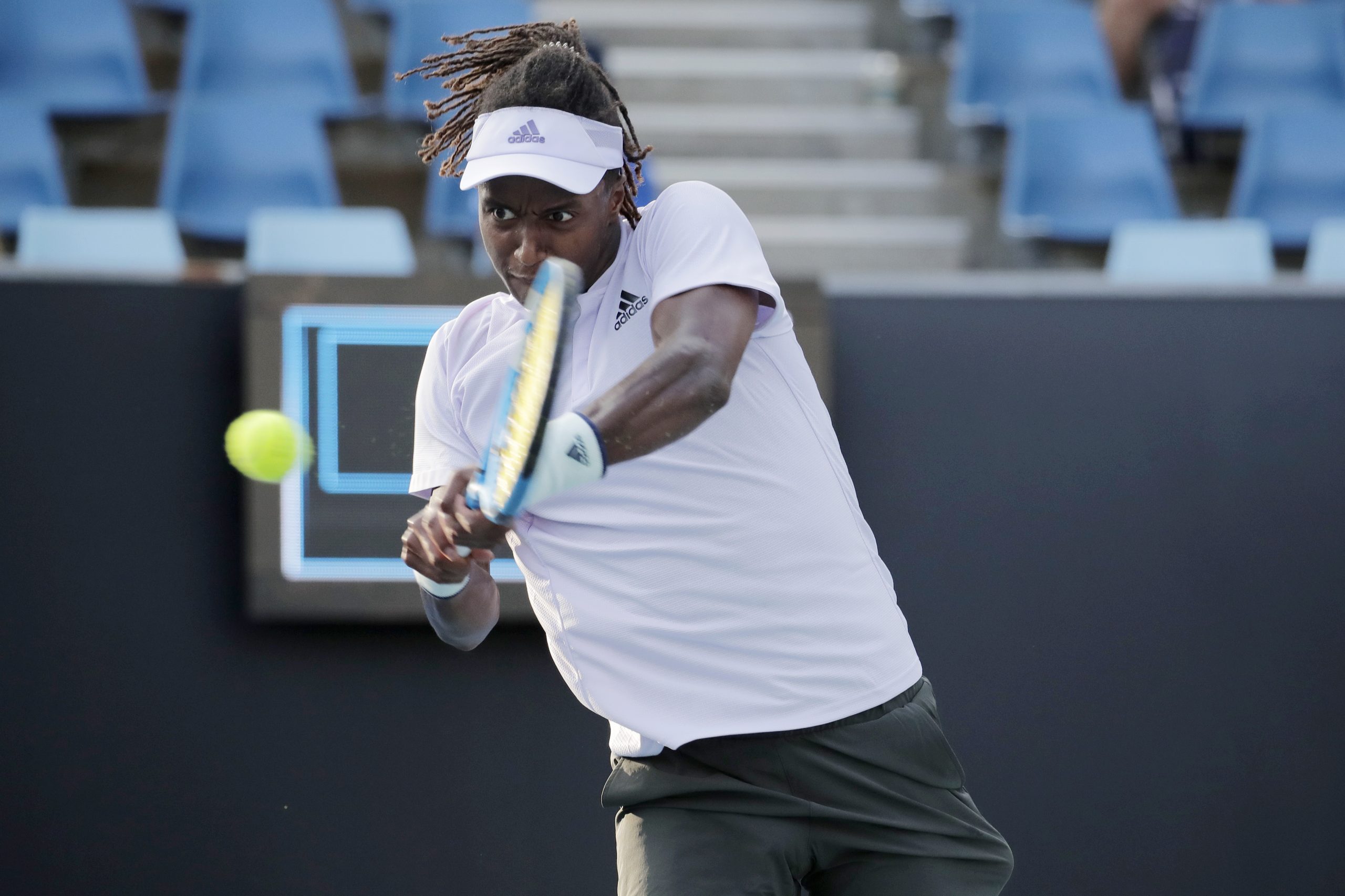 epa08153760 Mikael Ymer of Sweden in action during his men's singles second round match against Karen Khachanov of Russia at the Australian Open Grand Slam tennis tournament in Melbourne, Australia, 23 January 2020. EPA-EFE/FRANCIS MALASIG
