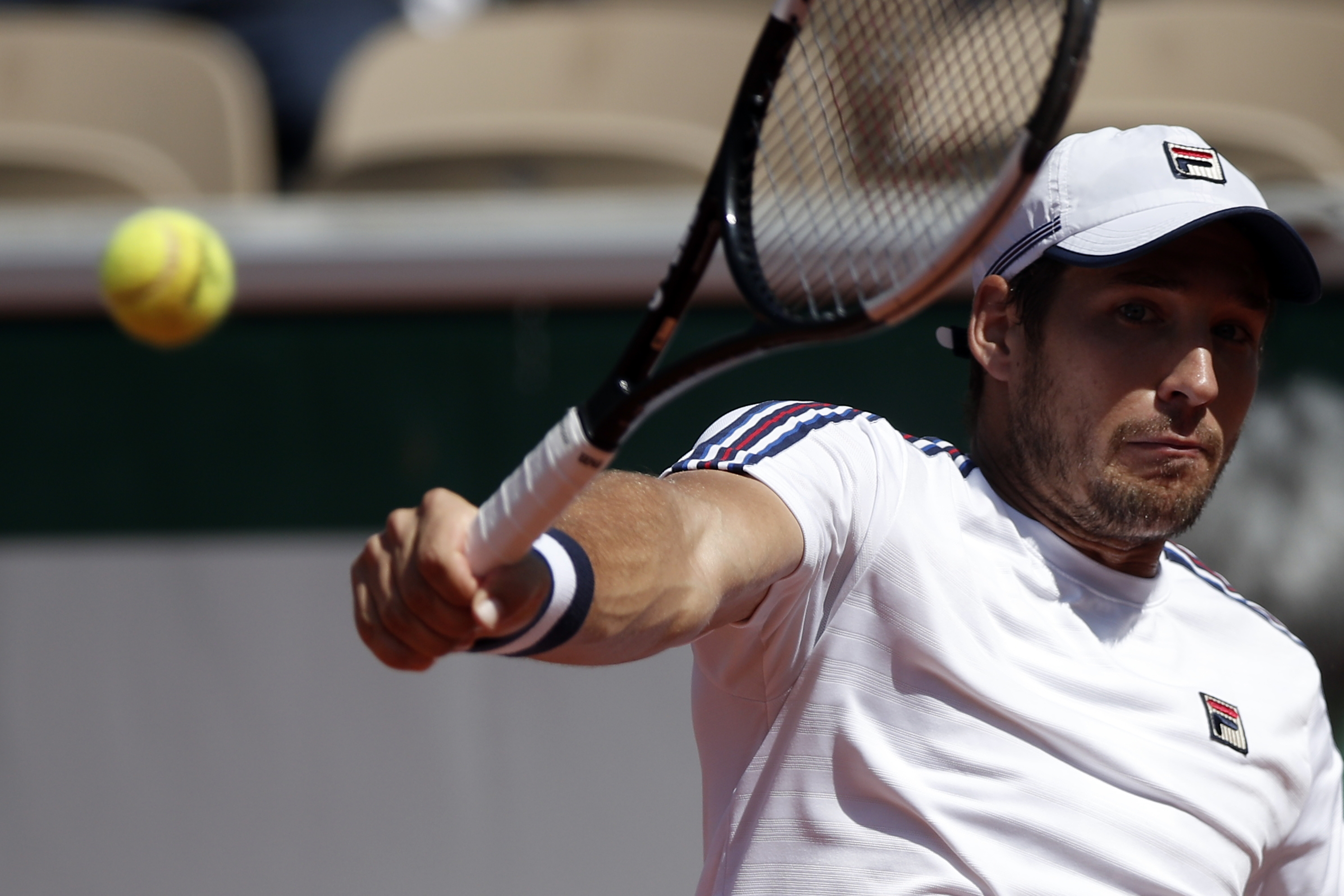 epa07617114 Dusan Lajovic of Serbia plays Alexander Zverev of Germany during their men?s third round match during the French Open tennis tournament at Roland Garros in Paris, France, 01 June 2019.  EPA-EFE/YOAN VALAT
