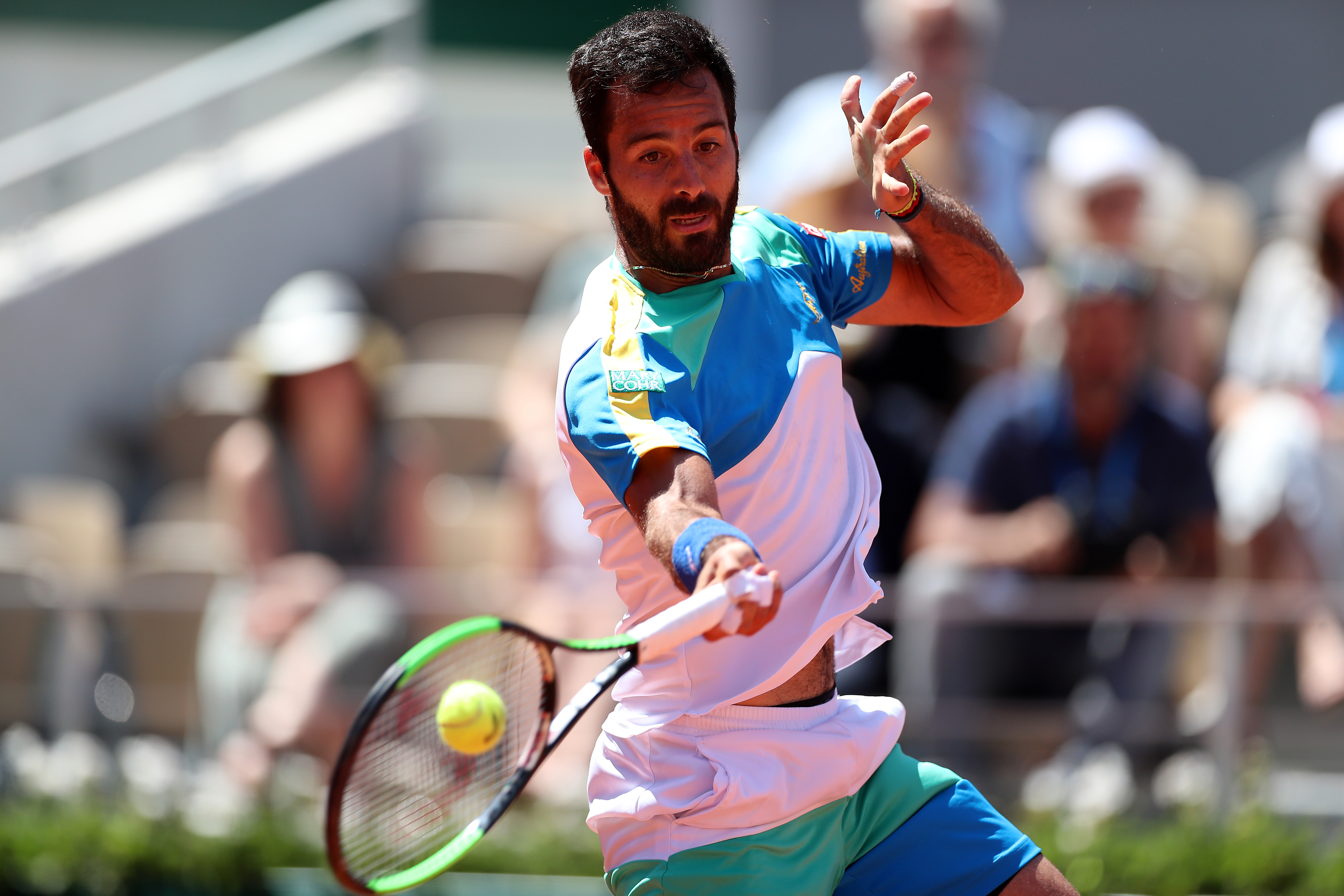 epa07617668 Salvatore Caruso of Italy plays Novak Djokovic of Serbia during their men?s third round match during the French Open tennis tournament at Roland Garros in Paris, France, 01 June 2019.  EPA-EFE/SRDJAN SUKI