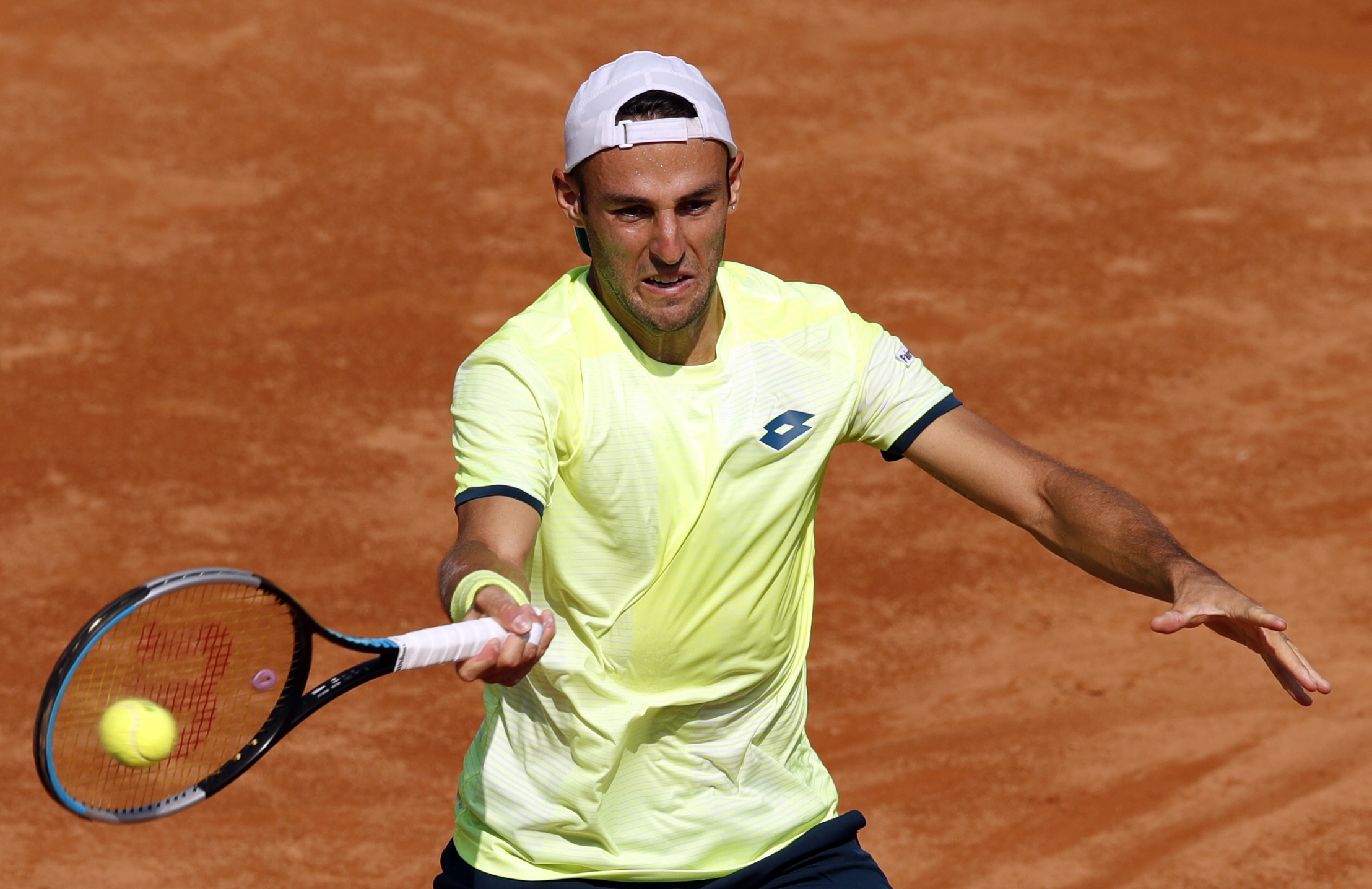 epa08672794 Stefano Travaglia of Italy in action during his second round match against Borna Coric of Croatia at the Italian Open in Rome, Italy, 16 September 2020.  EPA-EFE/Clive Brunskill / POOL